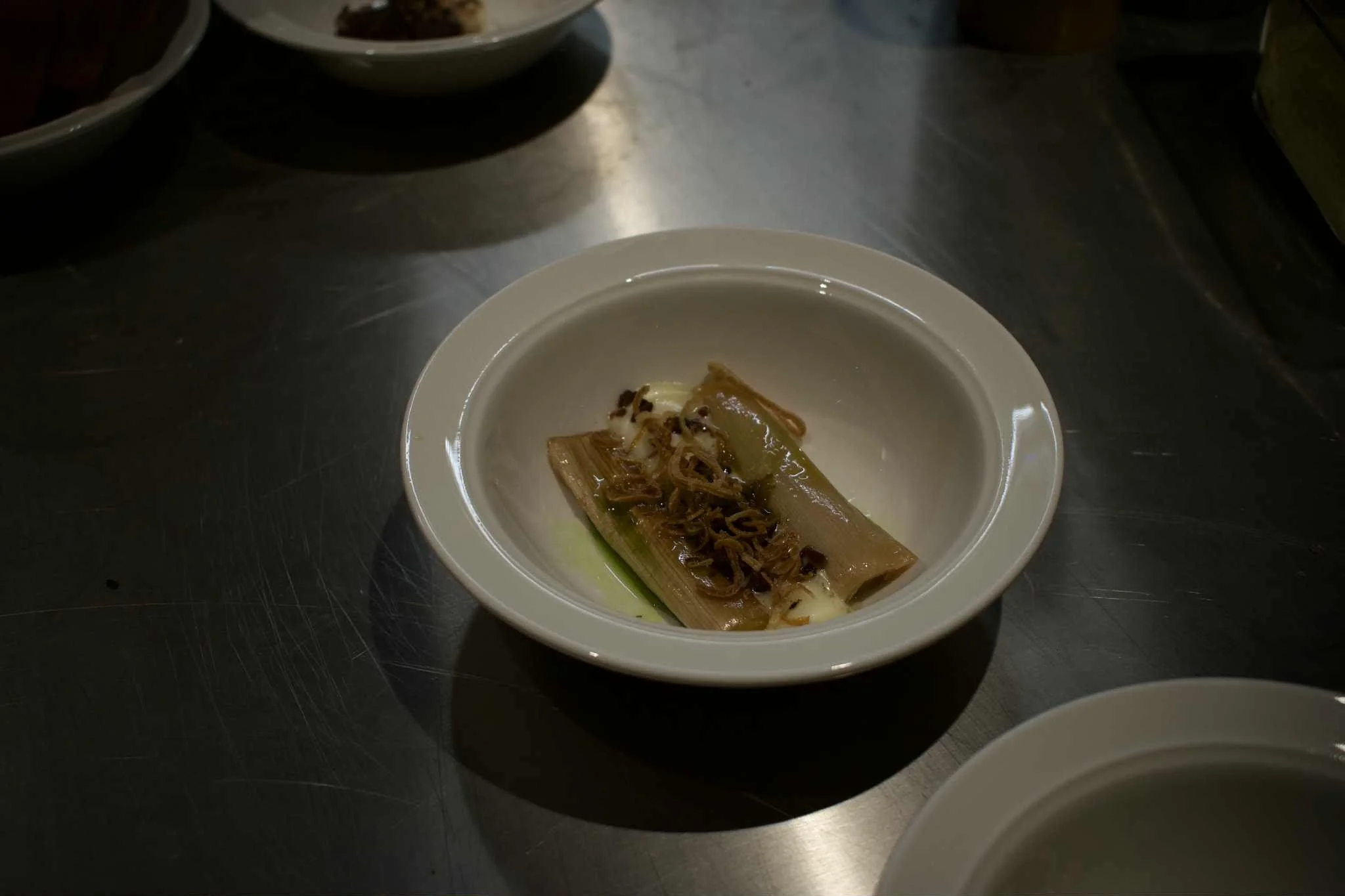 Starter with leek and smoked pork