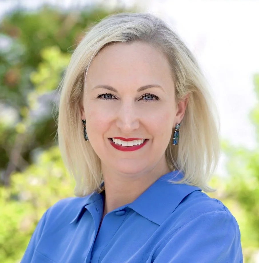 Woman with blonde hair and blue eyes