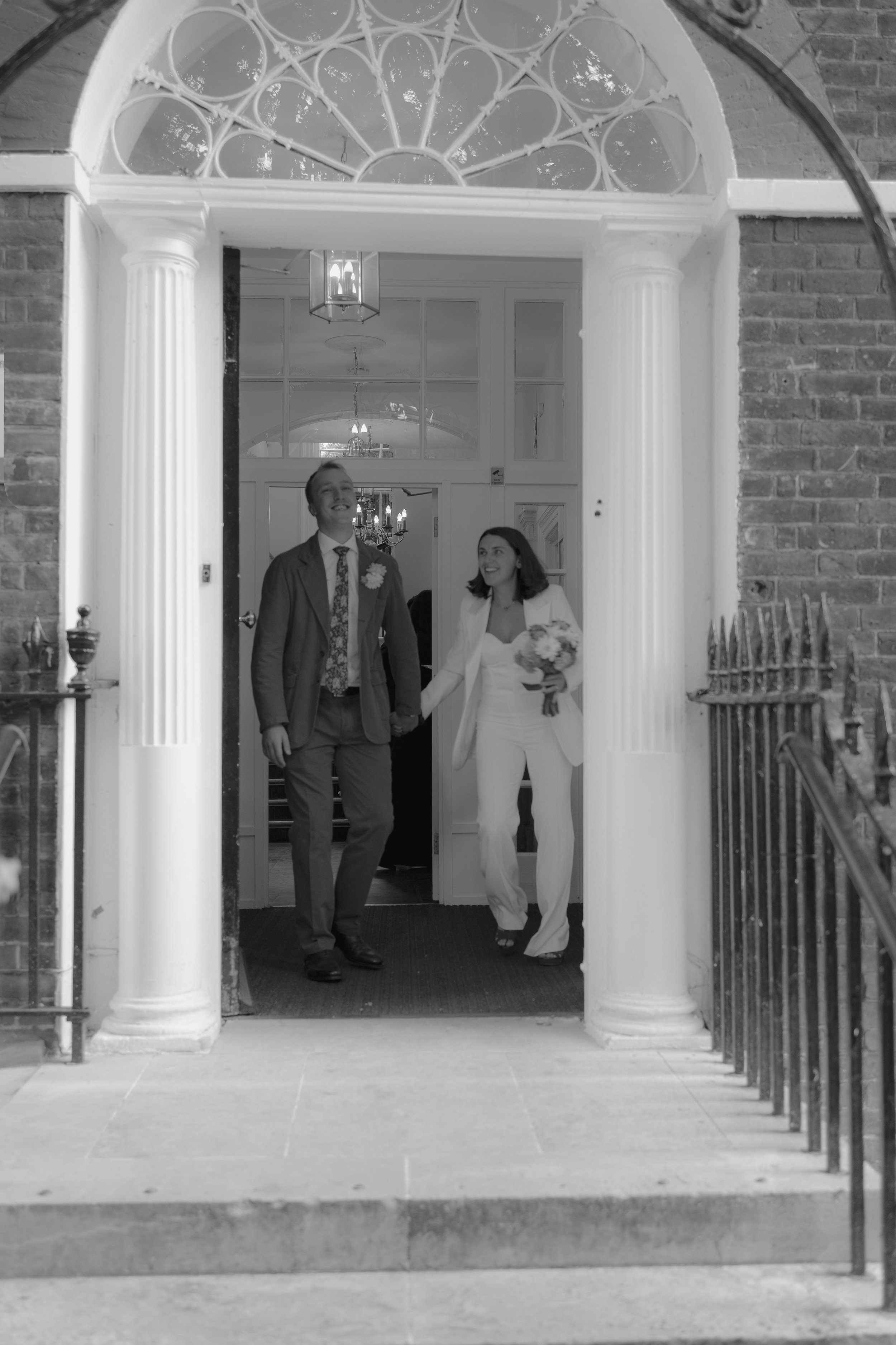 bride and groom exiting Southwark registry office