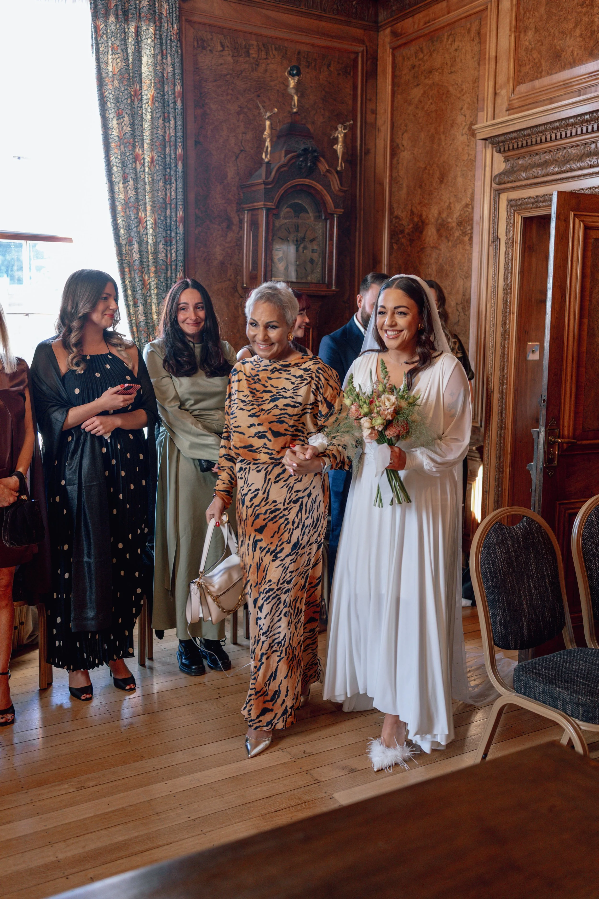 mum walking bride down the aisle