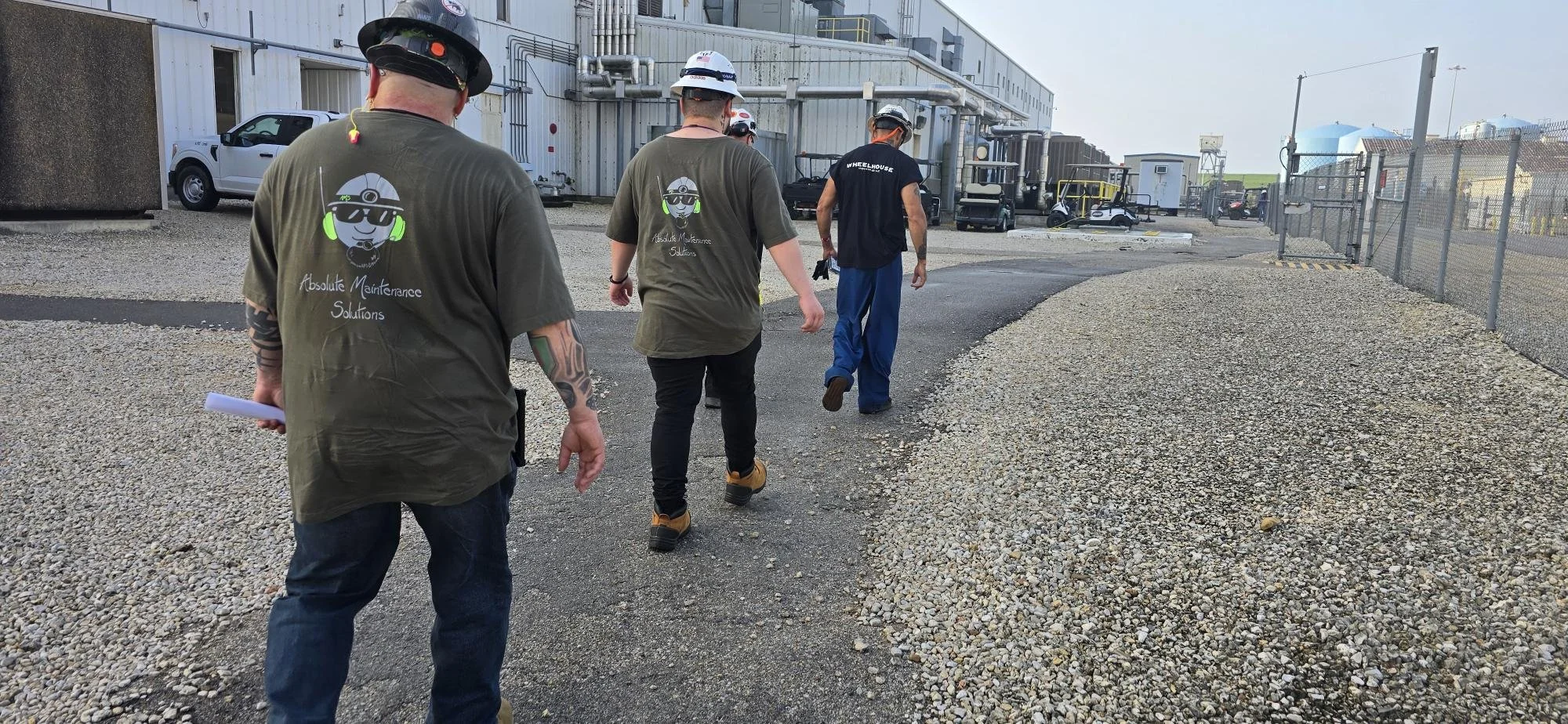 Absolute Maintenance Solutions team walking towards our work area as we provided technical oversight for chemical cleaning and tube leak detection support at a nuclear power plant The tubes were evaluated at the end and still very clean and leak free