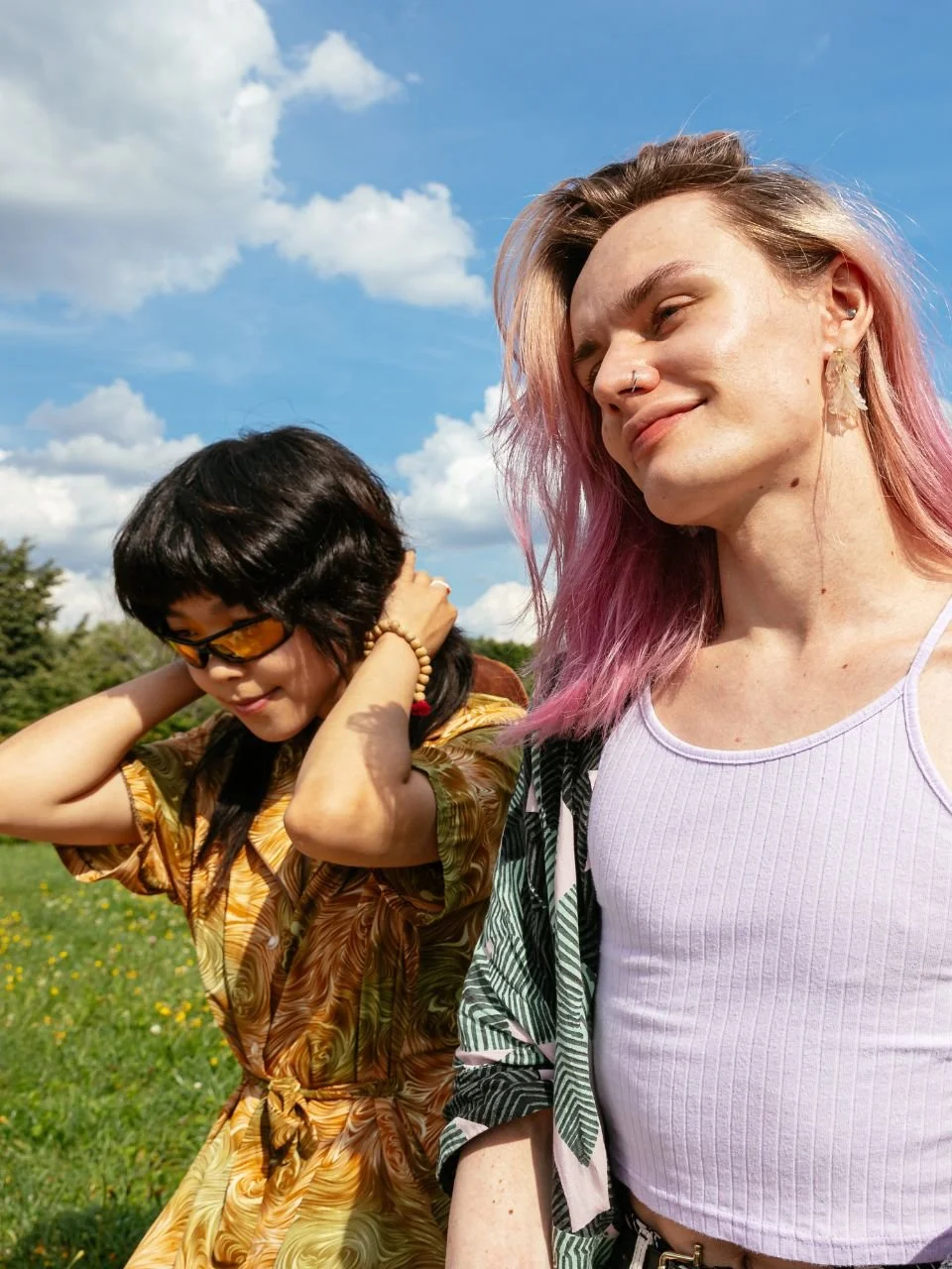 Two friends embracing outdoors, representing LGBTQ+ affirming therapy in Newport, Oregon