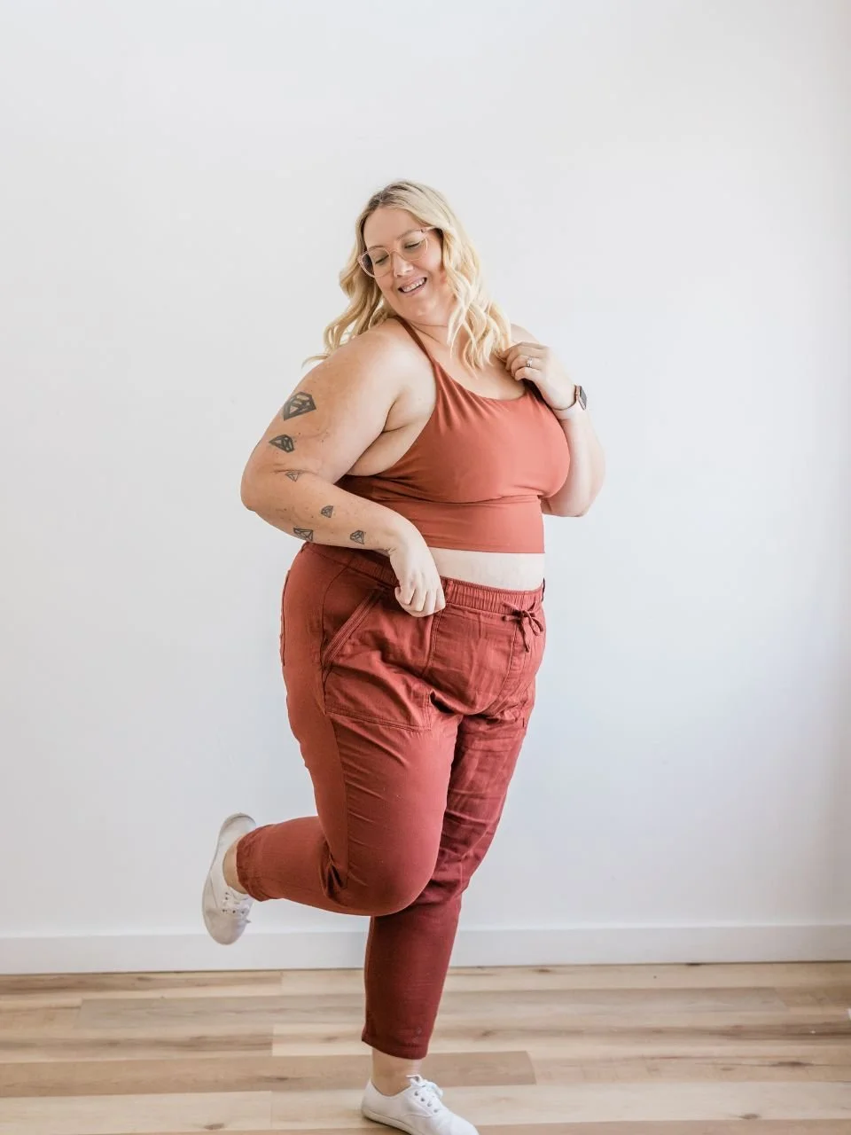Woman confidently posing, representing body image and disordered eating therapy in Newport, Oregon