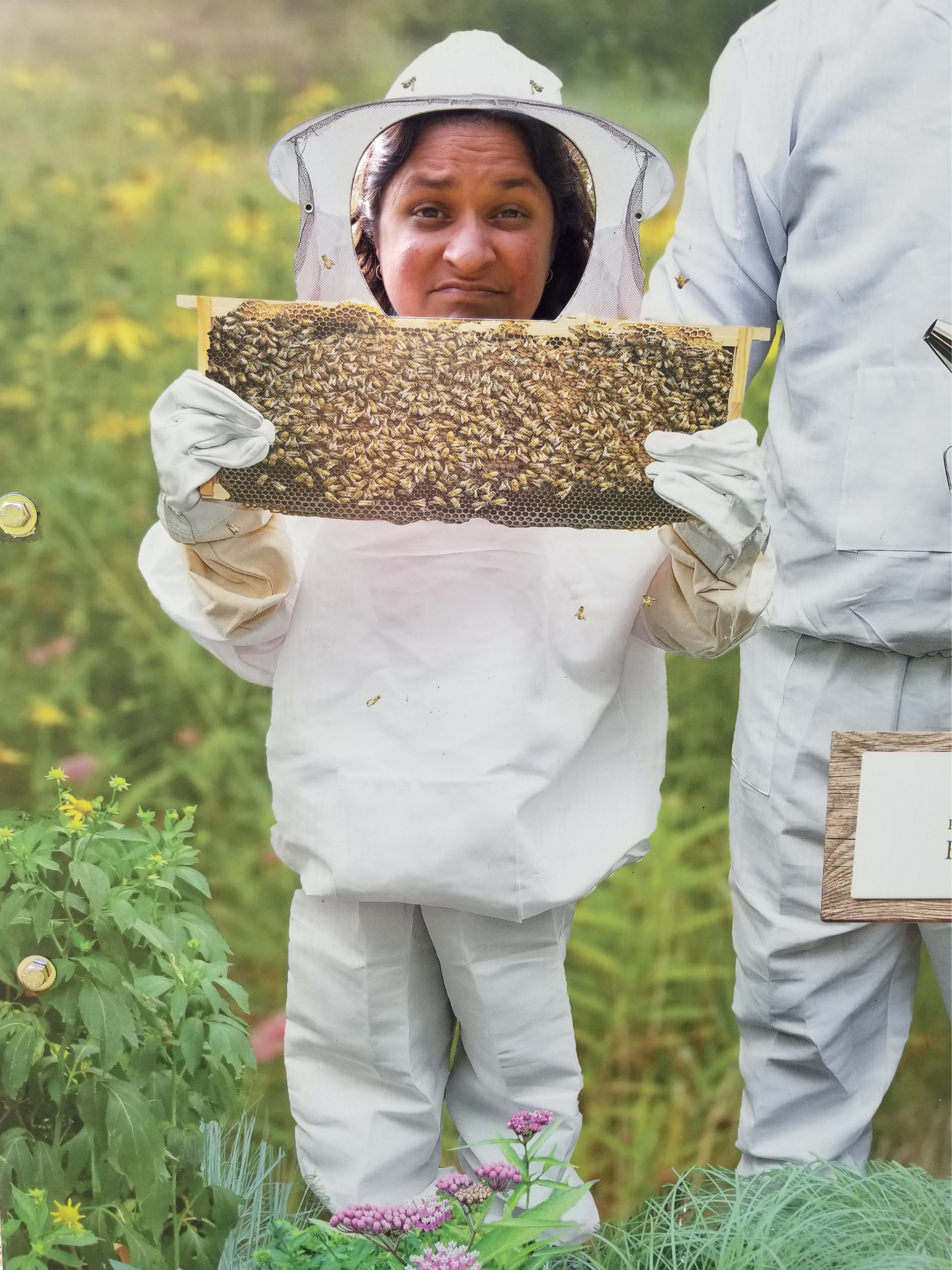 Funny picture of Wise Honey team dressing up like a beekeeper at Pittsburgh Botanic Gardens