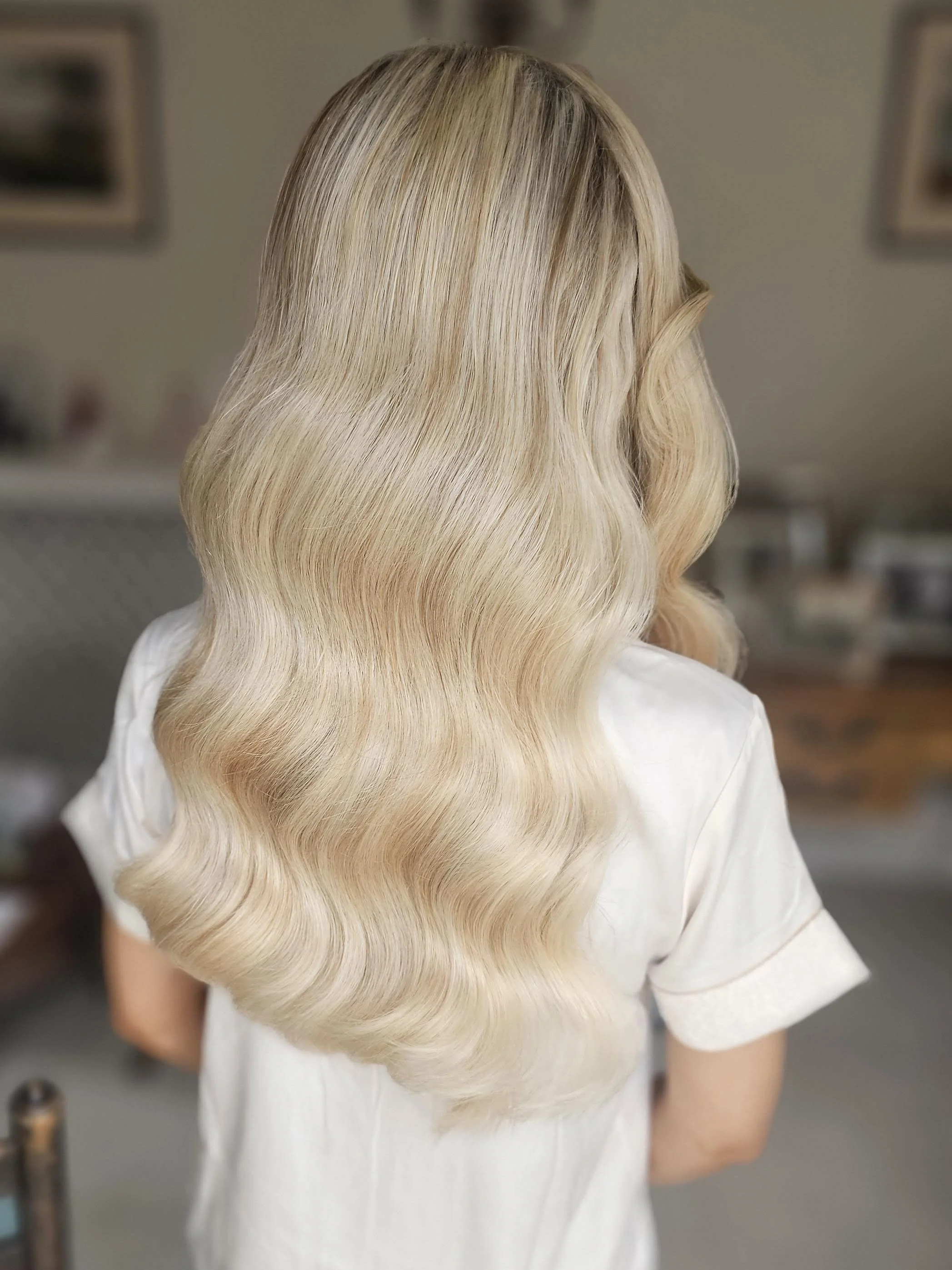 A picture of Luxury Hollywood Waves from the back, soft curls the fall effortlessly into place