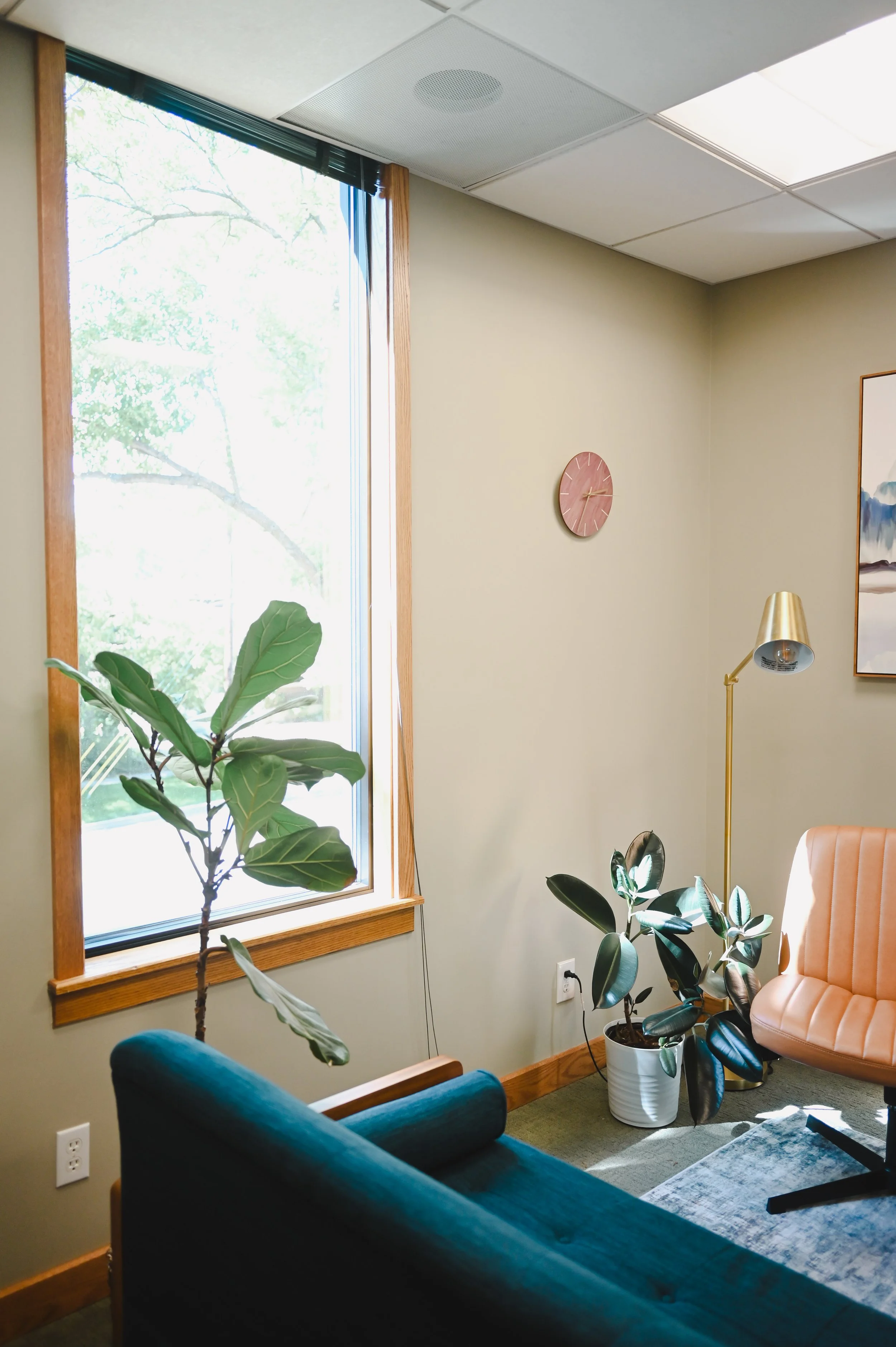 Warm and welcoming therapy office at New Heights Counseling in Salt Lake City with comfortable seating, natural light, and a calm environment for individual therapy.
