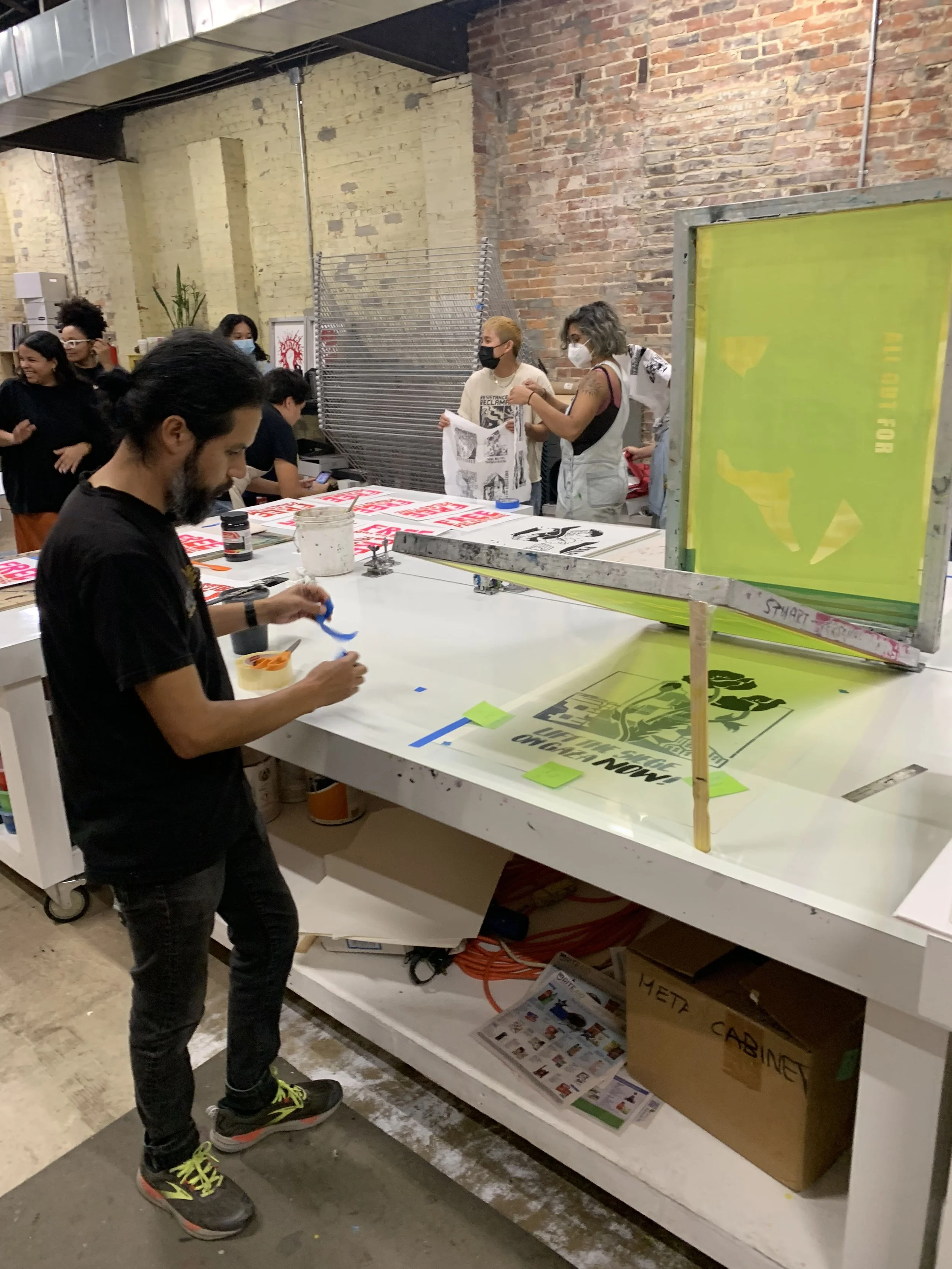 Nando Alvarez creating work for Free Palestine (2024)