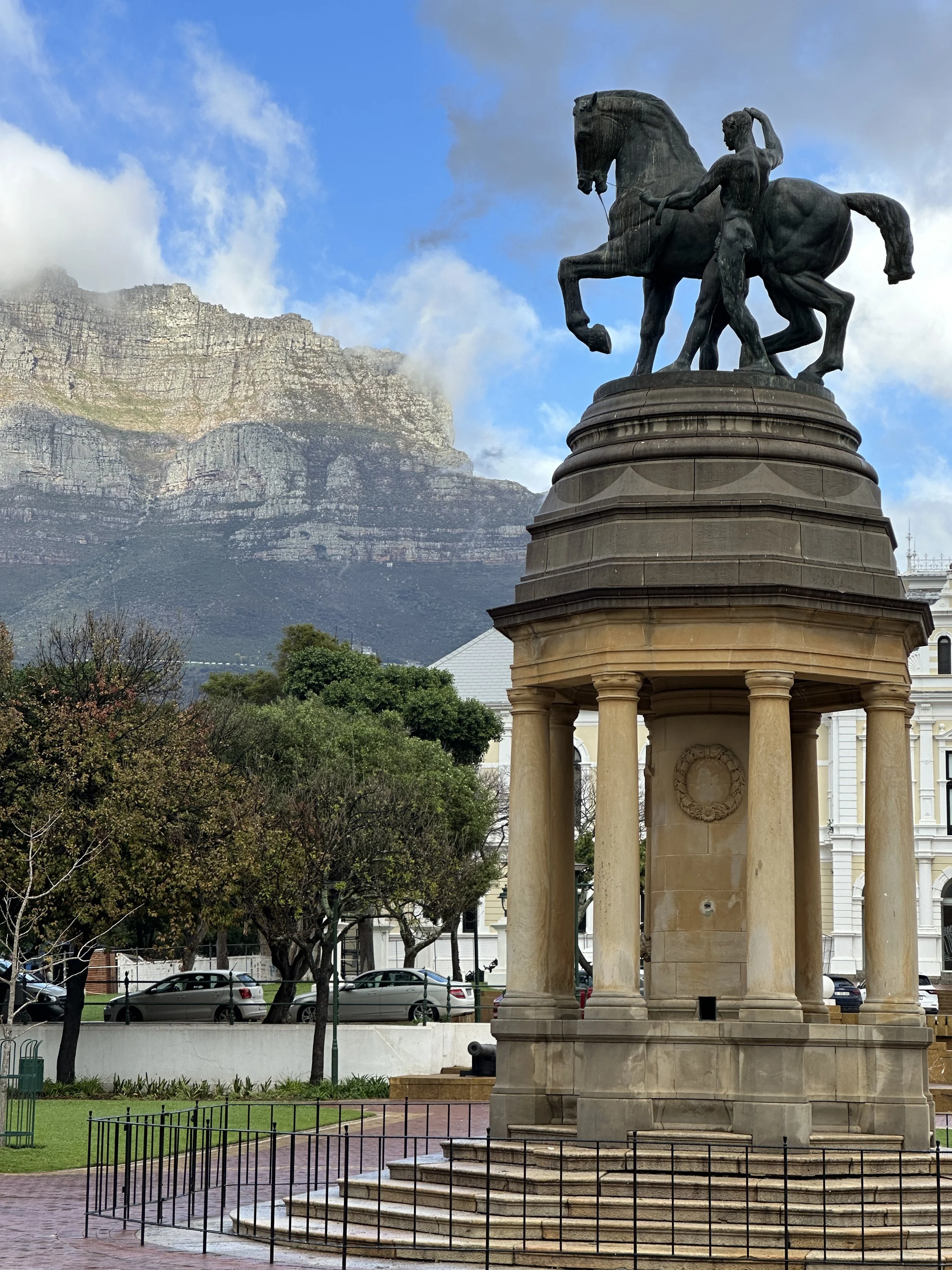 An equestrian statue with Table Mountain rising in the background, Cape Town.