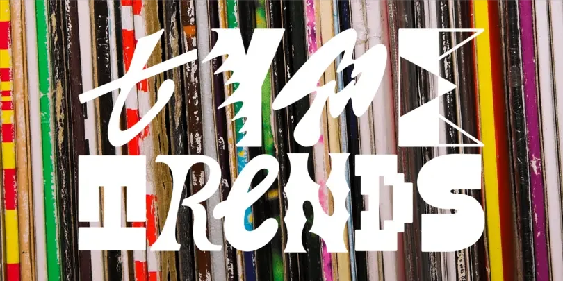 Colorful assortment of pencils and pens arranged vertically with white stylized text overlay.