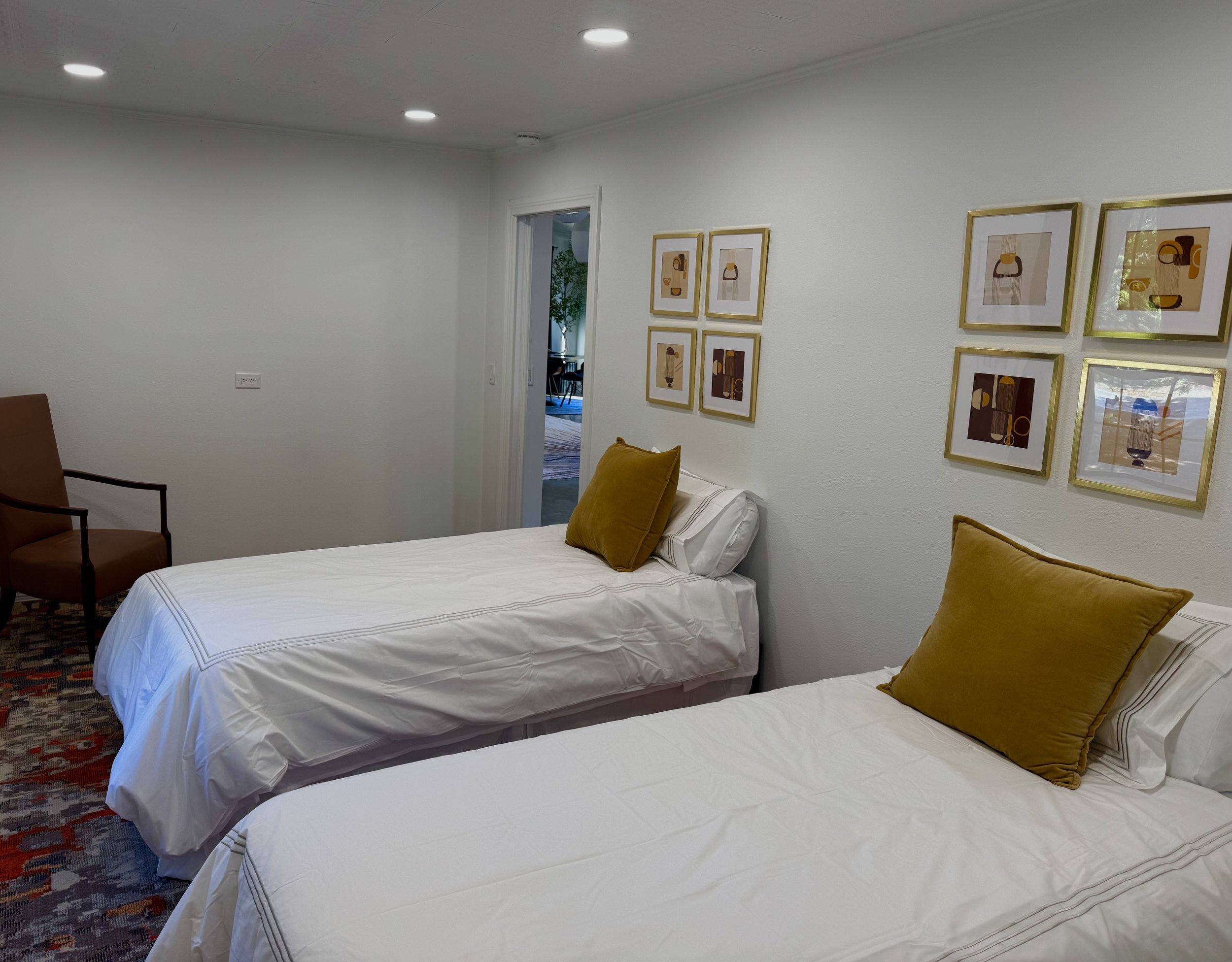 Two twin beds adorn the second bedroom.