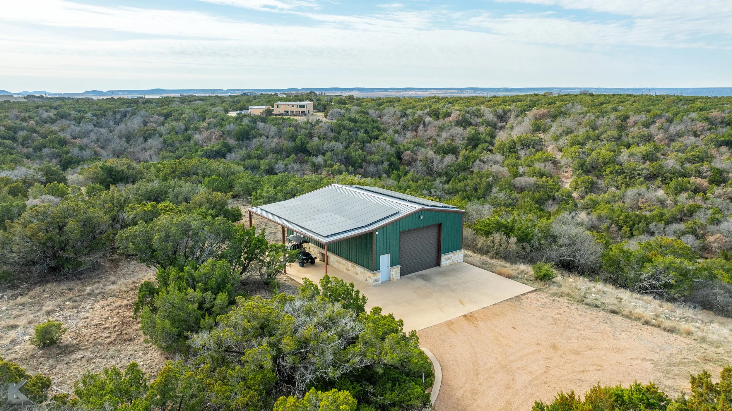 The detached 1220 square foot workshop is equipped with a commercial HVAC unit & provides ample room for storage, projects, or shelter for up to 4 additional vehicles.