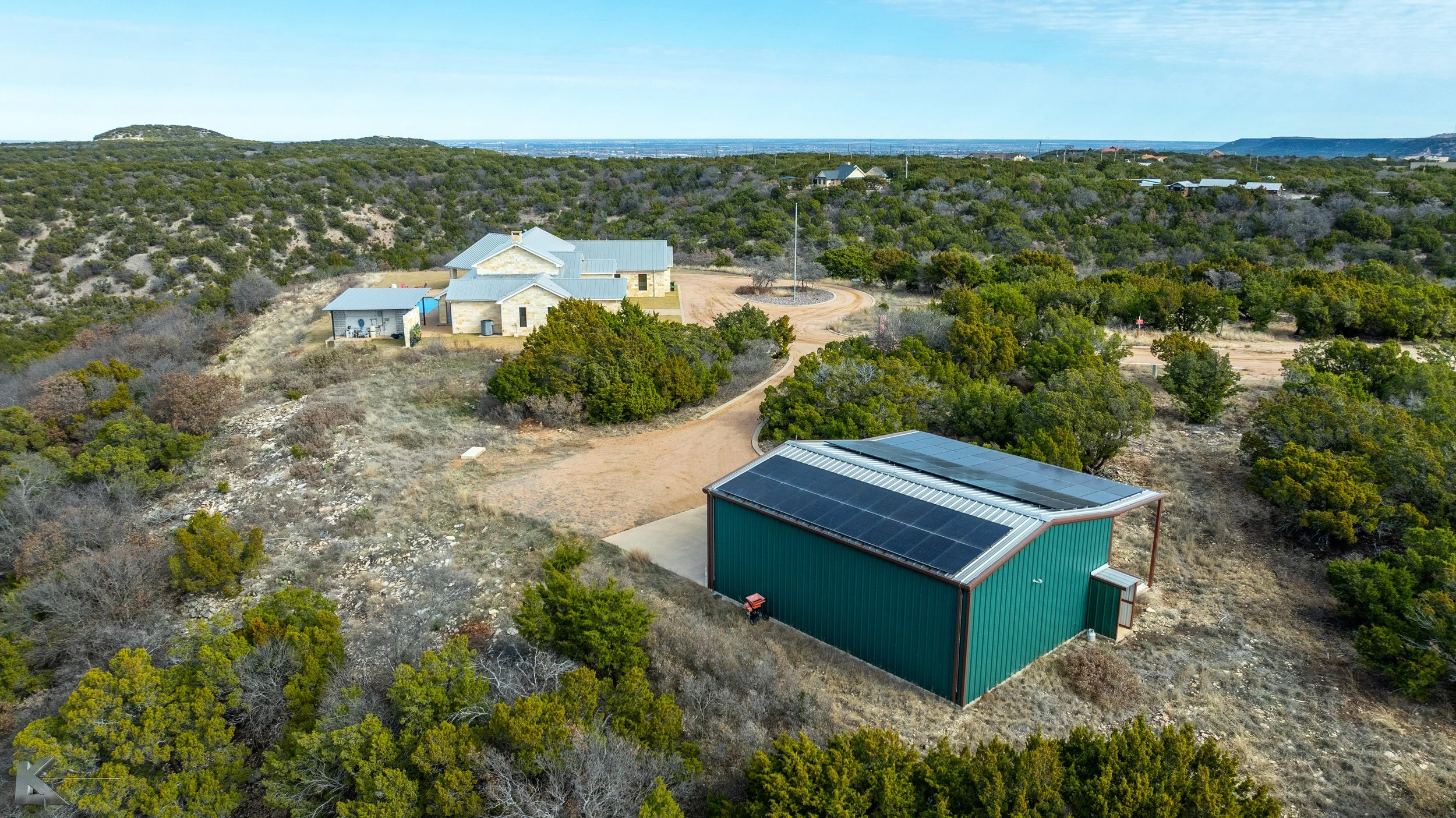 The workshop has seller-owned solar panels that provide power to the house & shop for reduced utility bills.