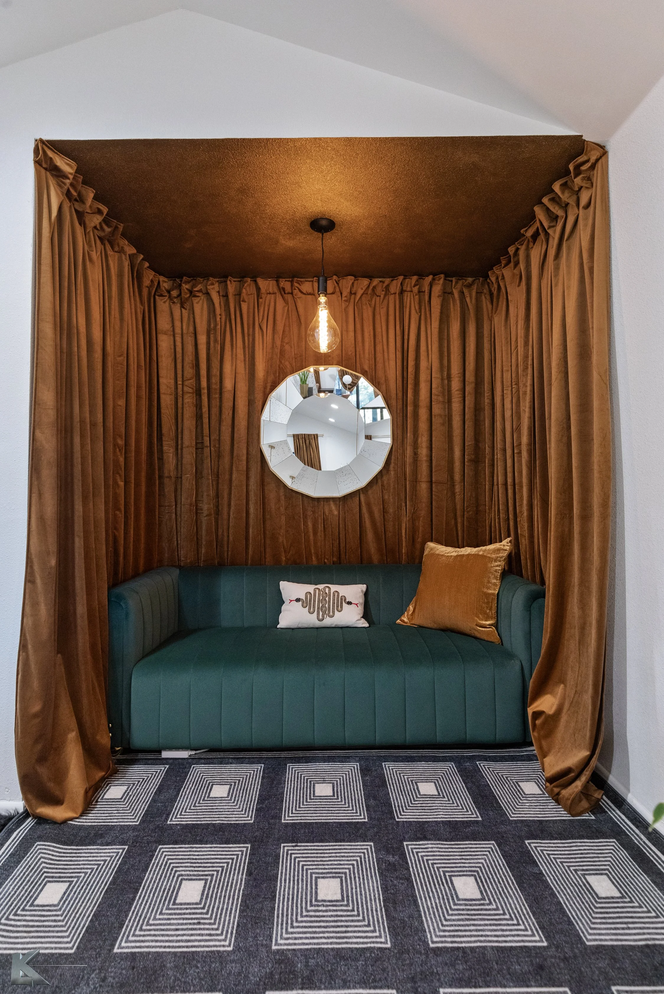 A unique in-set space adorns the primary bedroom.