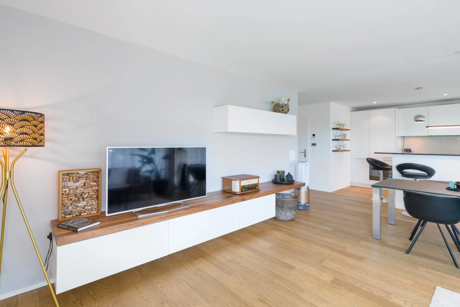 Grand living area with custom-made walnut furniture