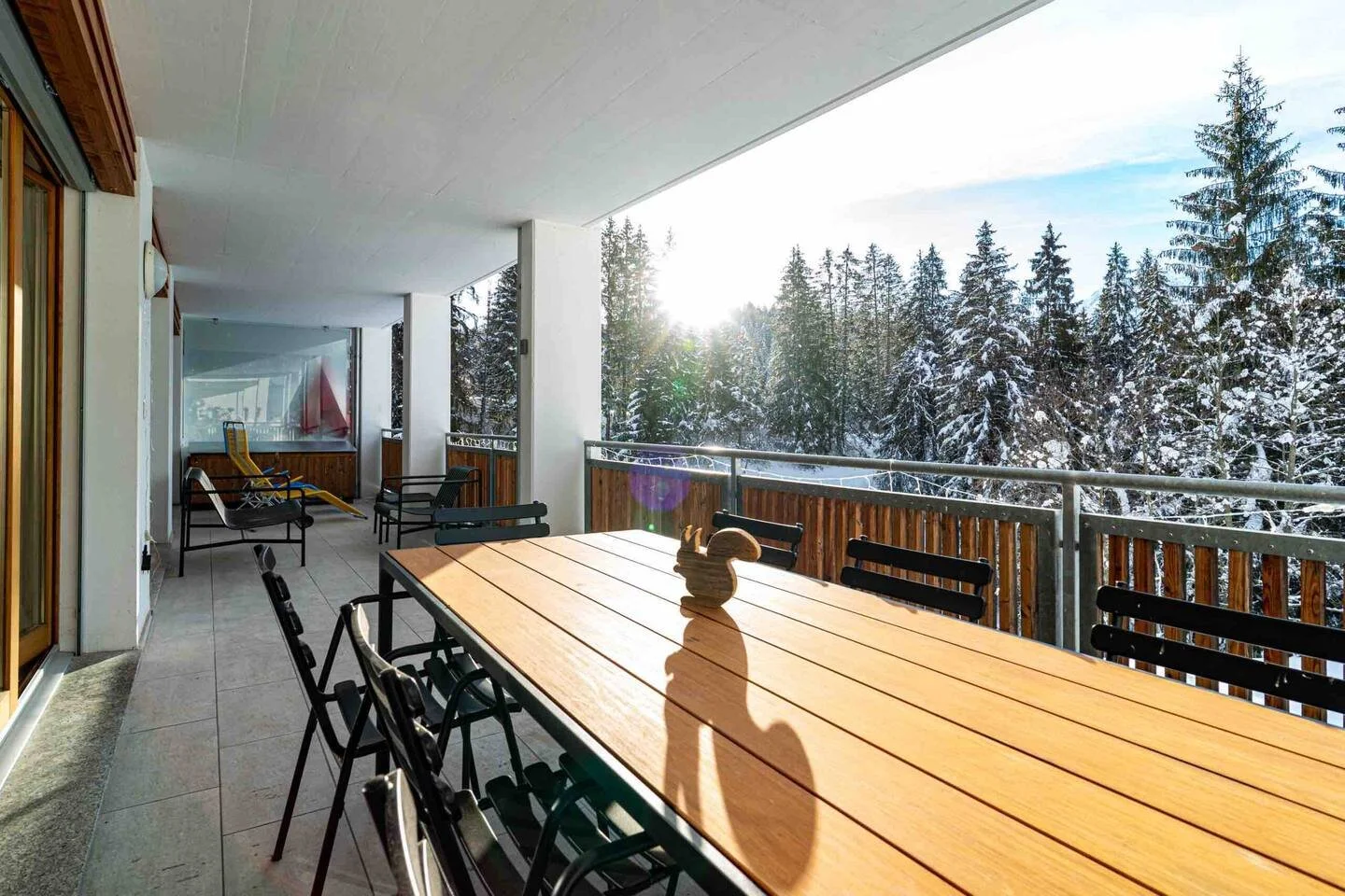 Large balcony with dining area and lounge