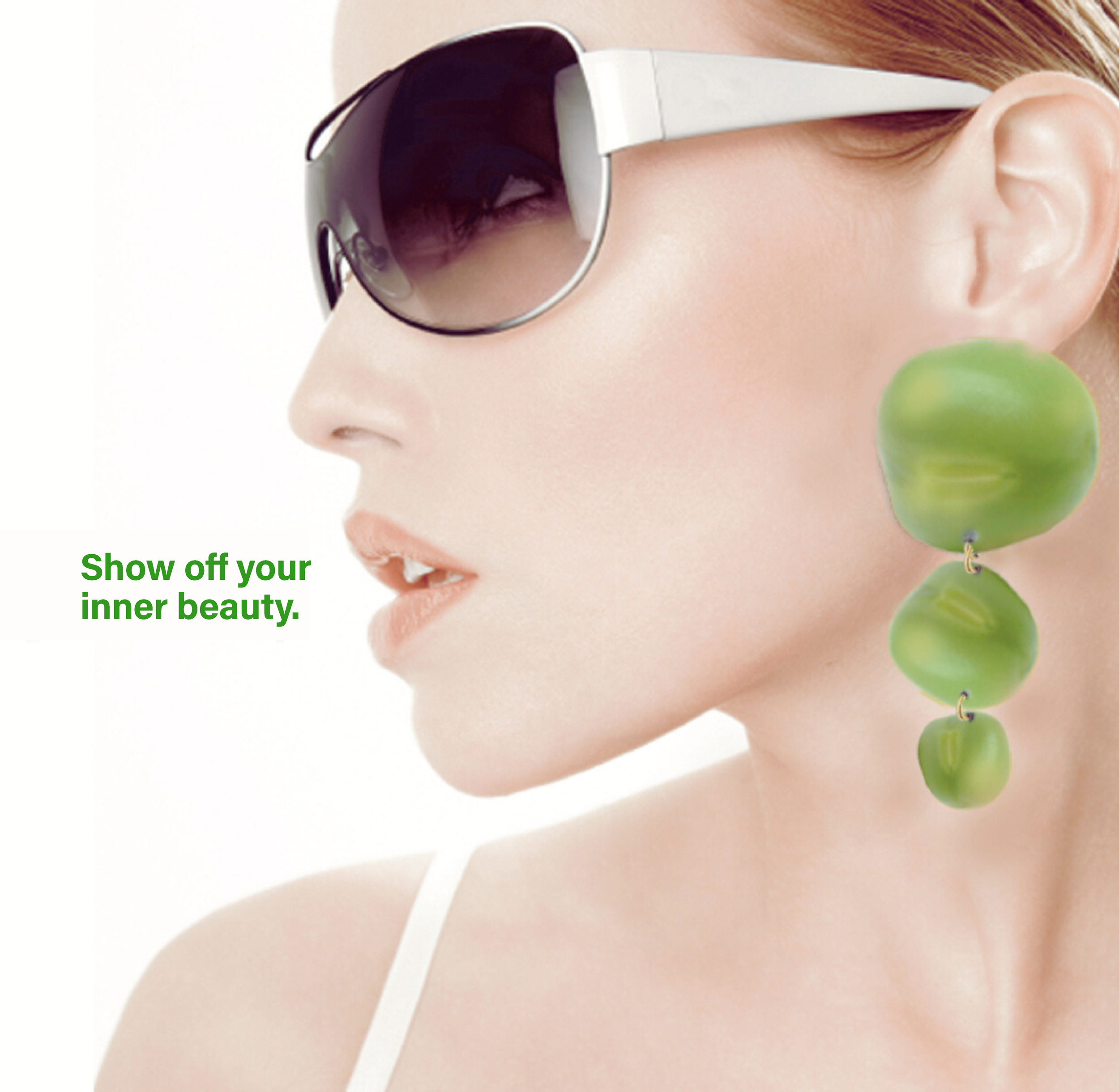 A close-up profile of a woman with blonde hair wearing large sunglasses and white straps, showing green earrings and a slogan in green text that reads 'Show off your inner beauty.'