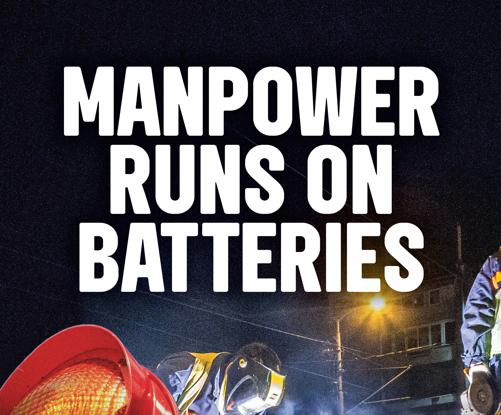 Nighttime street scene with workers wearing helmets and jackets, orange safety cones, and bright streetlights, overlaid with large white text stating 'Manpower Runs on Batteries'.
