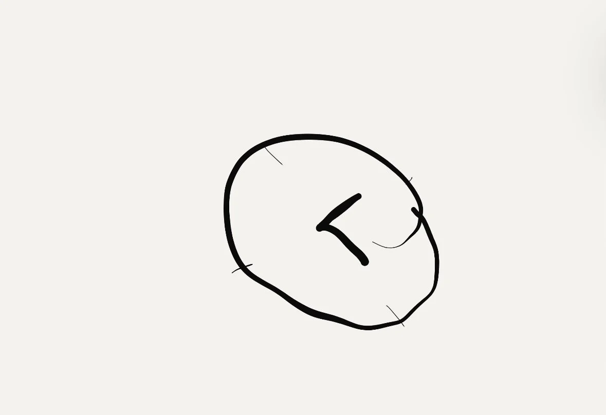 A simple black sketch of a round face with minimal features, showing closed eyes and a slight smile.