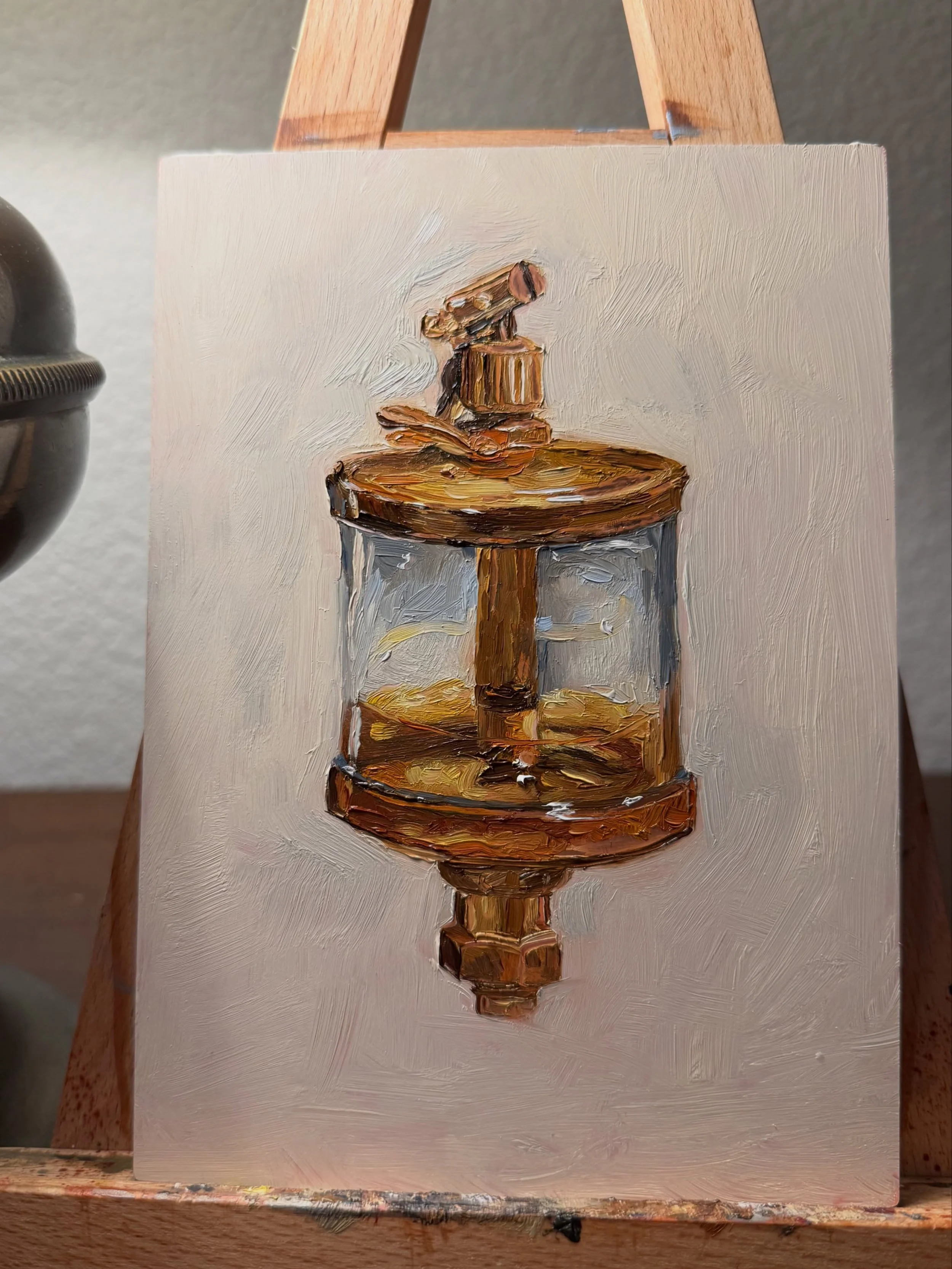 Oil painting on copper of a brass sight-feed oiler at the Western Museum of Mining & Industry, Colorado Springs.