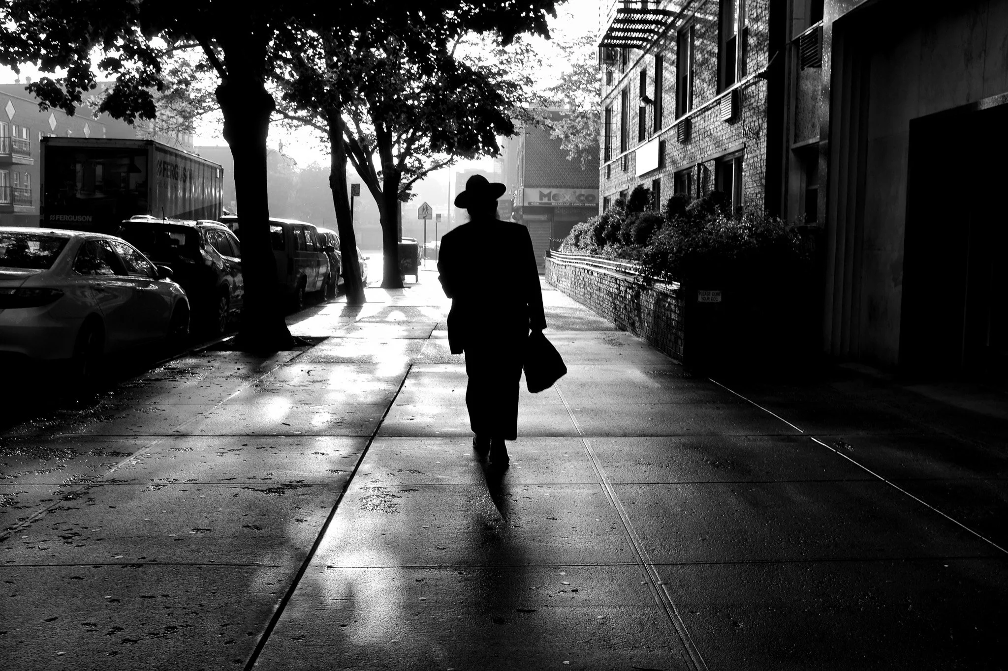 Man Walking Brooklyn Street, NYC