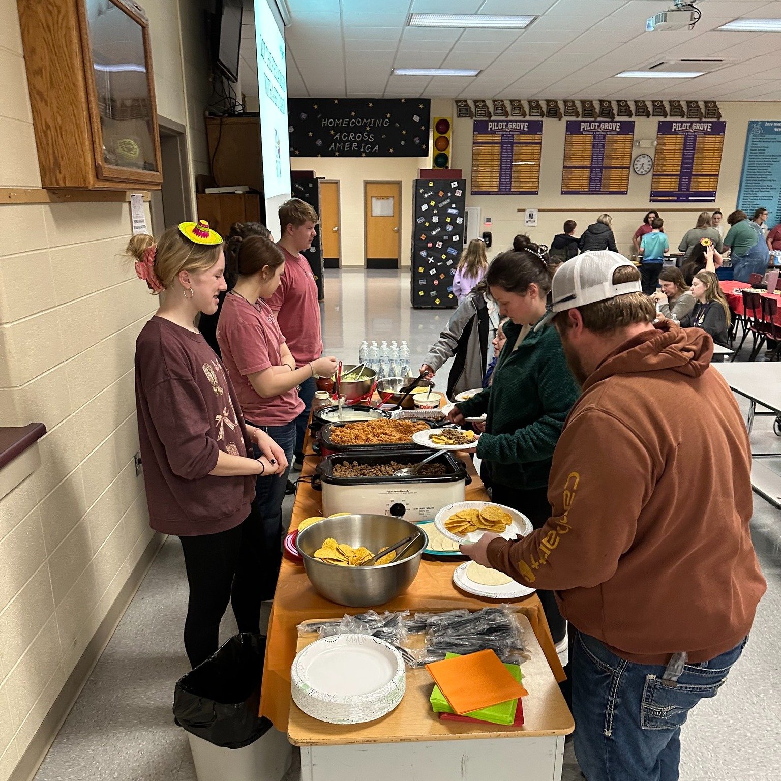 At last weeks Family Dinner, Pilot Grove Schools families enjoyed a delicious meal prepared and served by the High School FCCLA Club while staff shared reading and math highlights, along with strategies families can use at home to support student gro