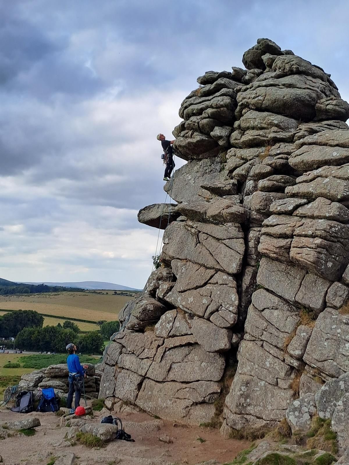 The guys tackling Pulpit (HVD) at Hound Tor on Dartmoor in excellent conditions on a recent meet to Dartmoor. According to the Rockfax guidebook:
&lsquo;Accessing the Pulpit from the left proves to be a grunt&hellip;&rsquo; and by all accounts that p