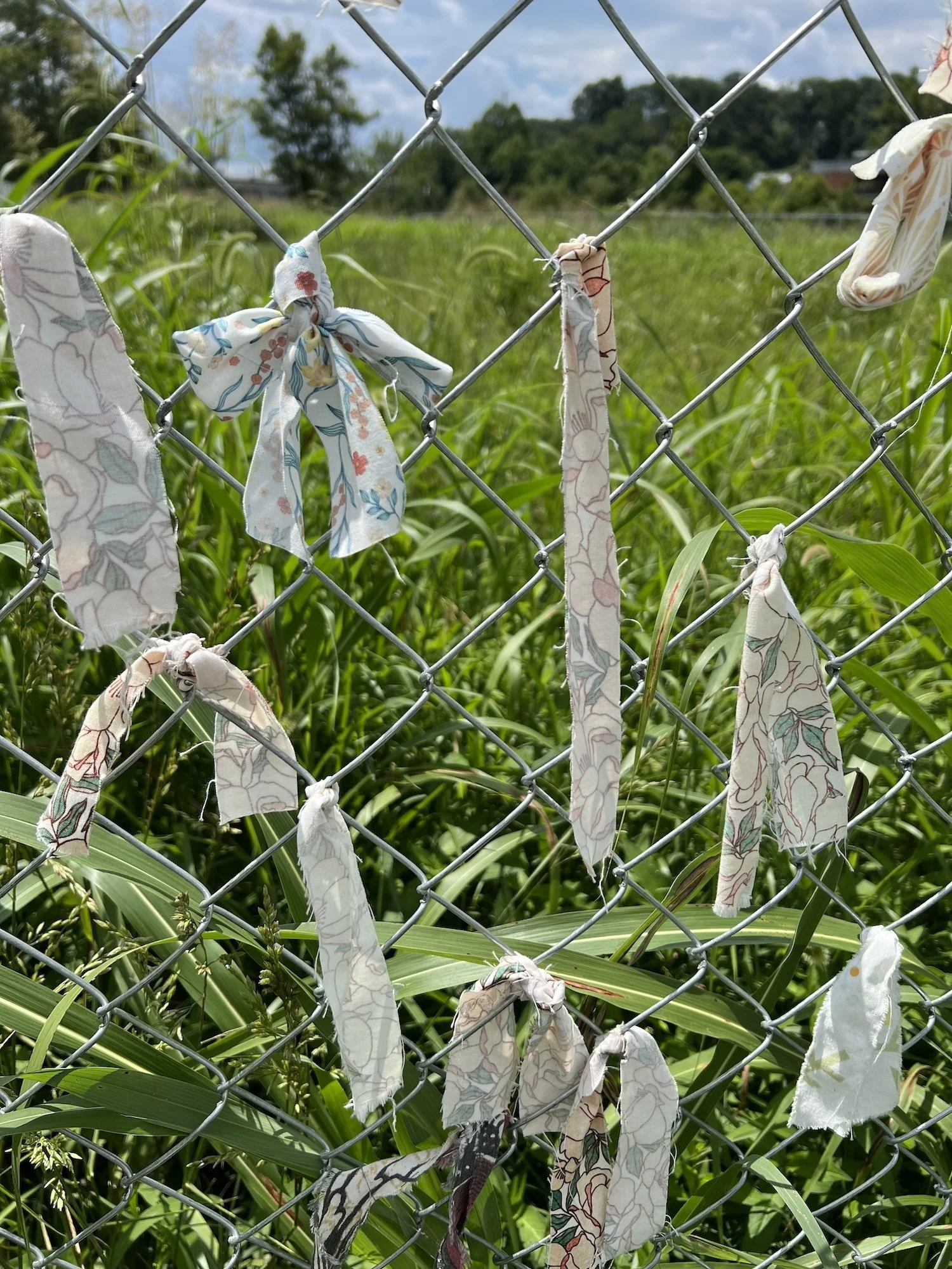 Fabric strips show fading and weathering after prolonged outdoor exposure.