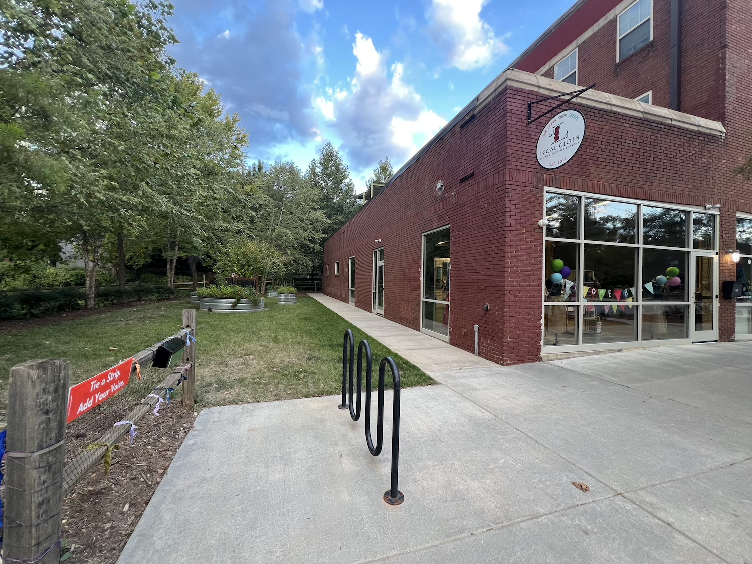 Street view of offsite activation installed outside the front entrance to Local Cloth.