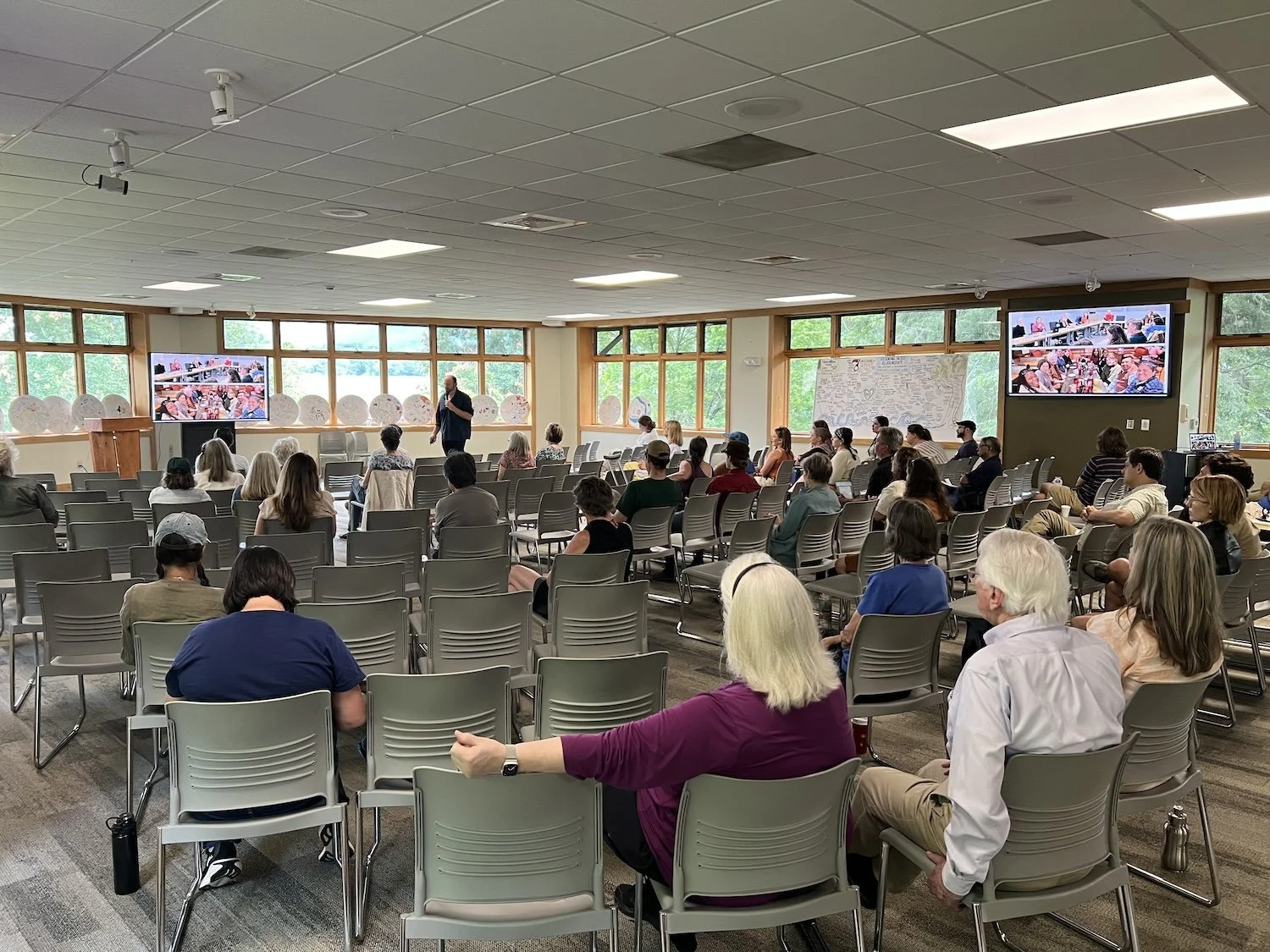 Thrive Asheville presentation of 'Lessons for the Recovery' report at environmental summit hosted by Warren Wilson College.