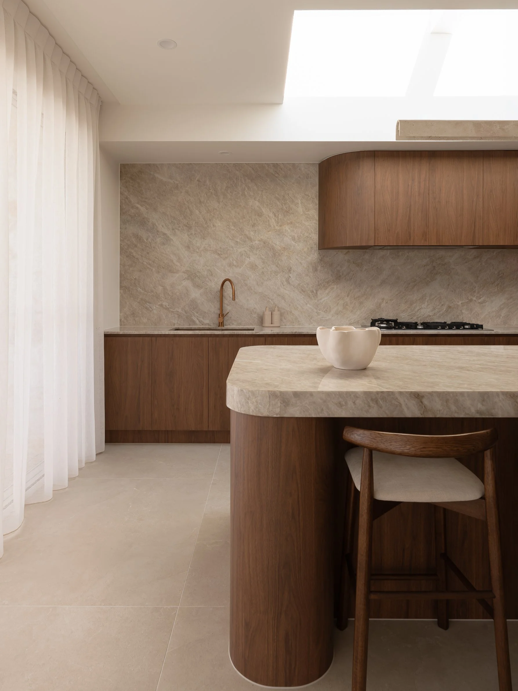 walnut kitchen with natural stone
