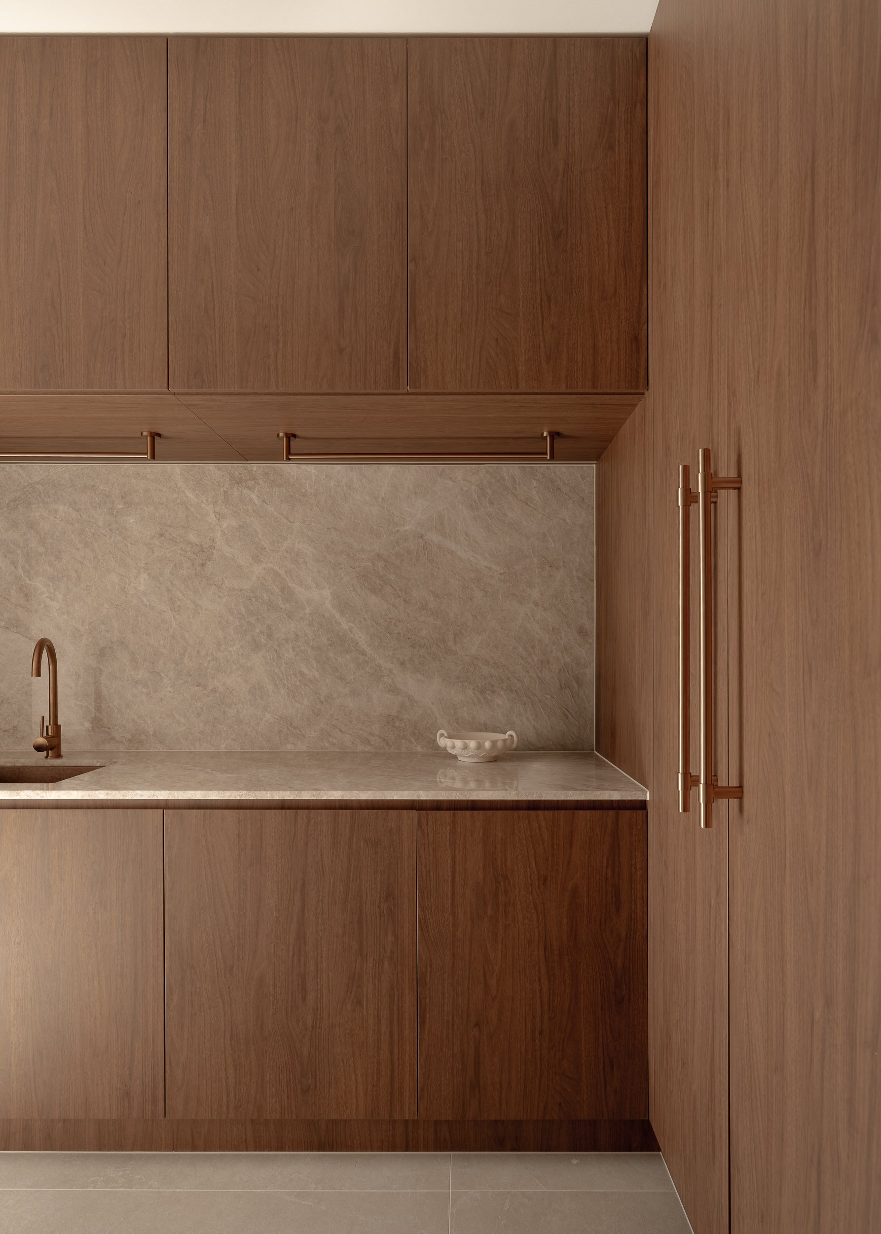 Laundry in florentine walnut by polytec, interior photography