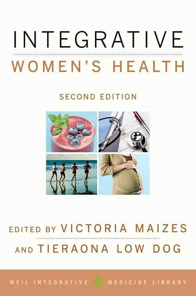 Book cover titled 'Integrative Women's Health, Second Edition,' edited by Victoria Maizes and Tieraona Low Dog, featuring images of a berry smoothie, medical tools, women running on the beach, and a pregnant woman.