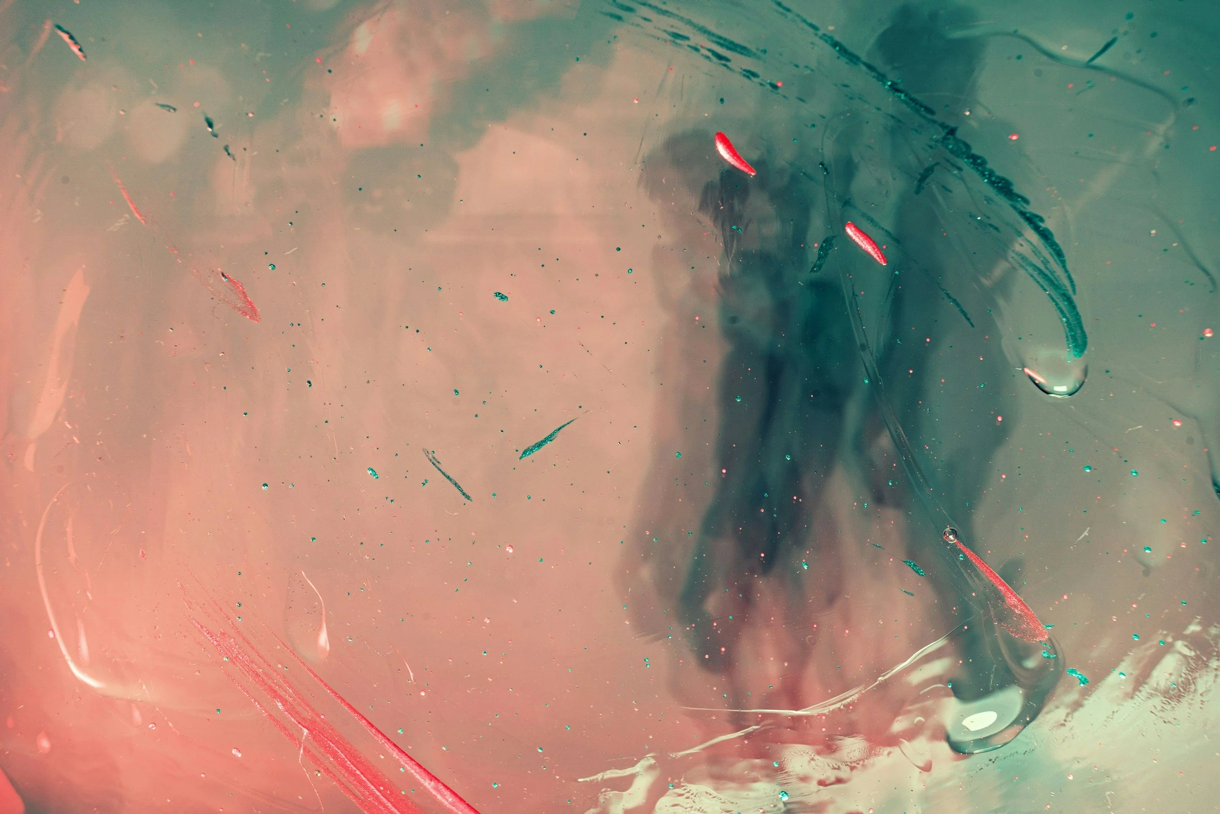 A couple holding hands in an abstract paining at dusk