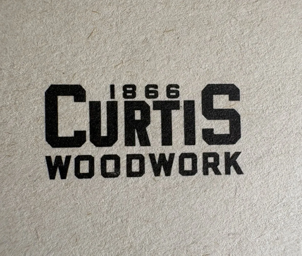 Logo of the Curtis Woodwork advertising