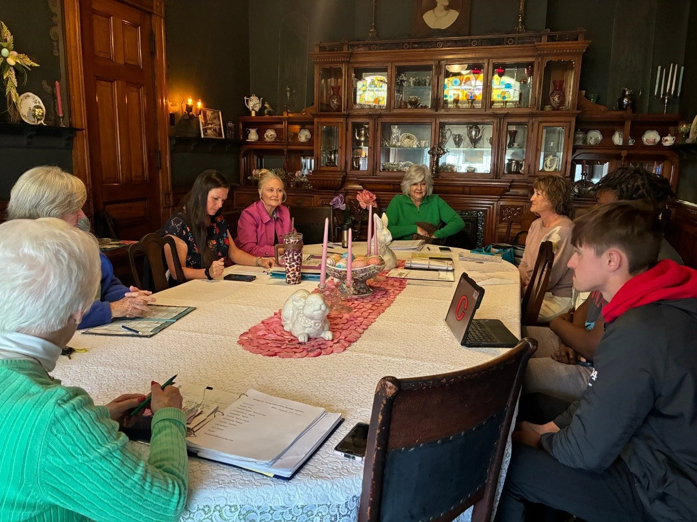 Clinton Women's Club Members instructing young men