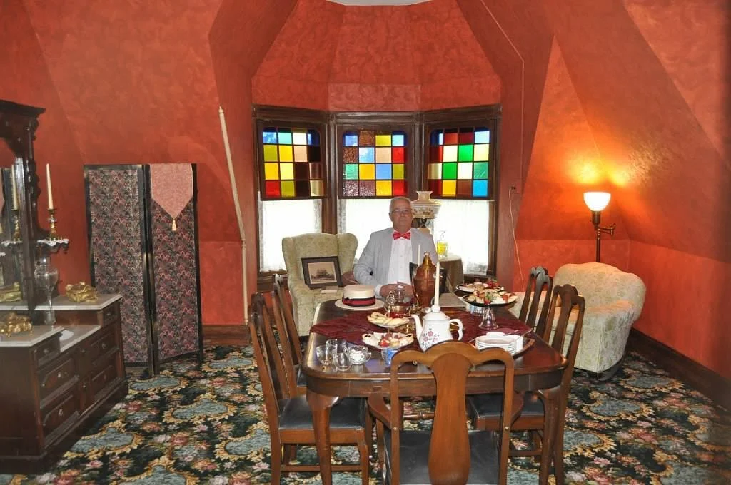Room set up for a tea party at the Curtis Masnion