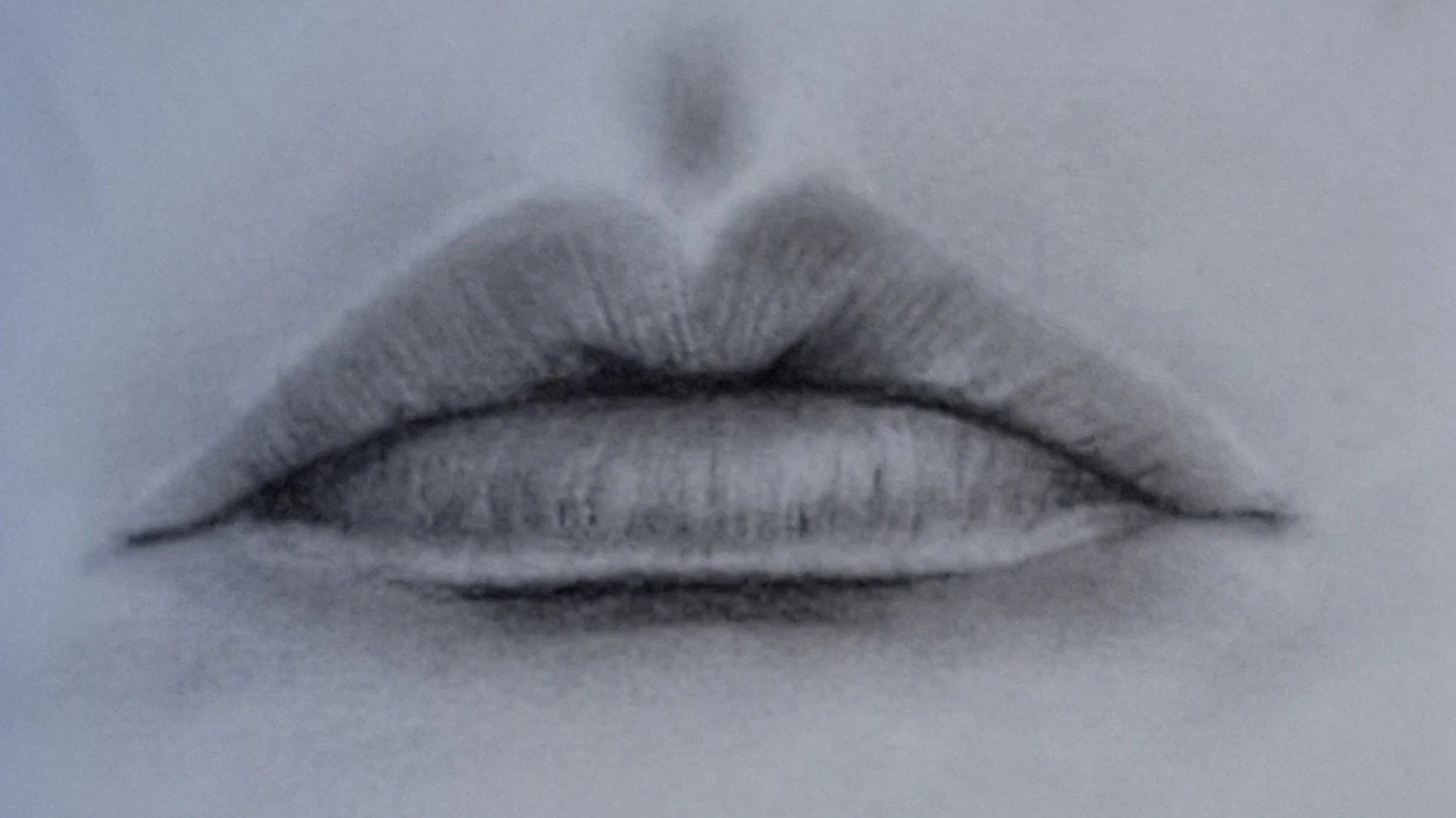 Close-up sketch of closed lips, with shading and subtle details.