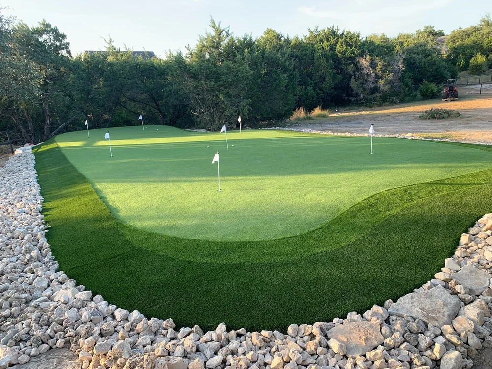 Spring Branch backyard putting green with elevation and 7 holes
