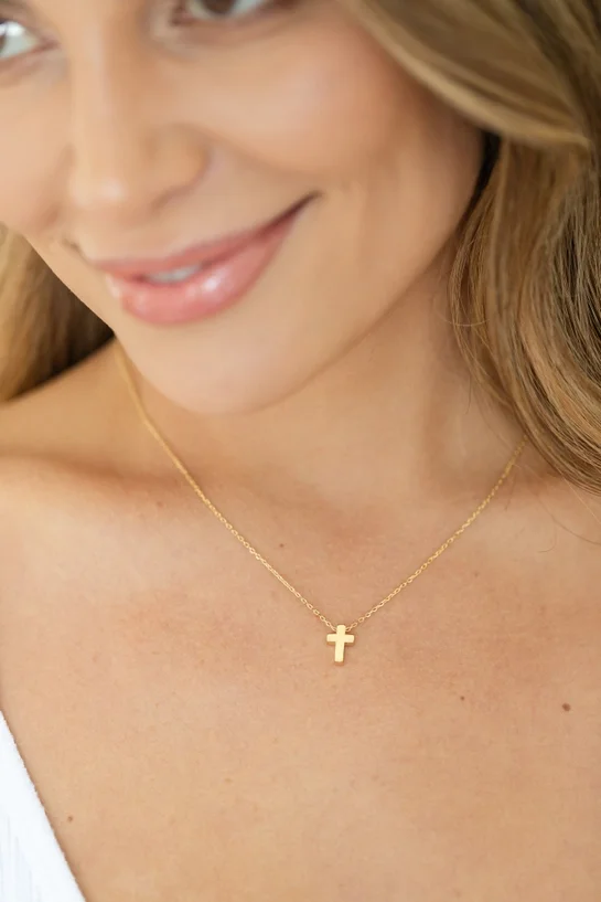 gold cross necklace.webp