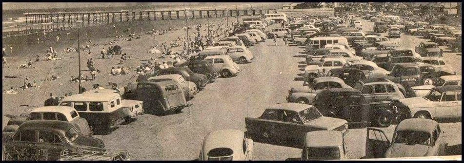 A hot day at the beach in the 1960's 