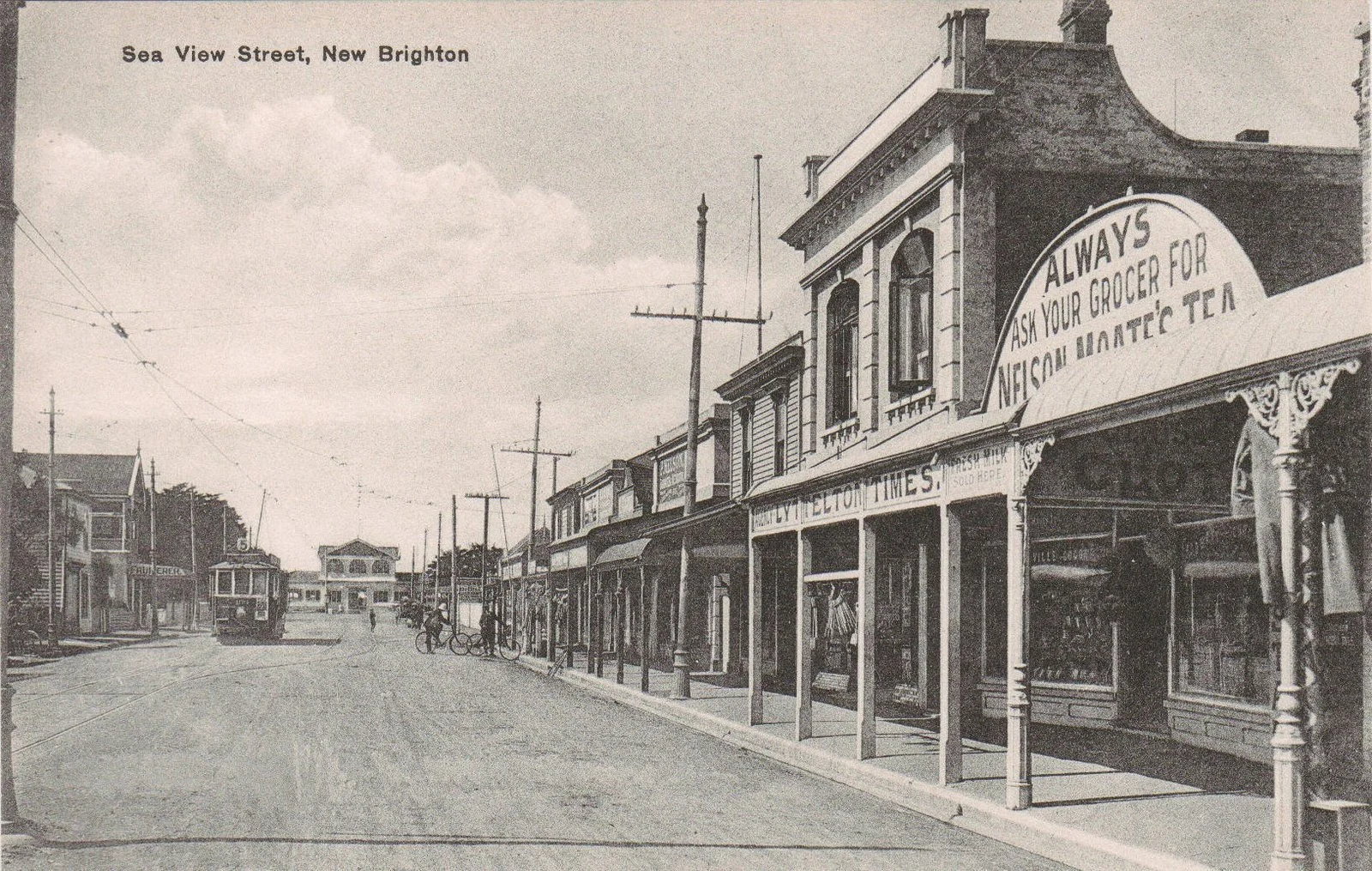 Sea View Road in 1910, an expanding into a vibrant commercial centre for locals and visitors. The tram line still pulled by horse increased accessibility and fueled growth.