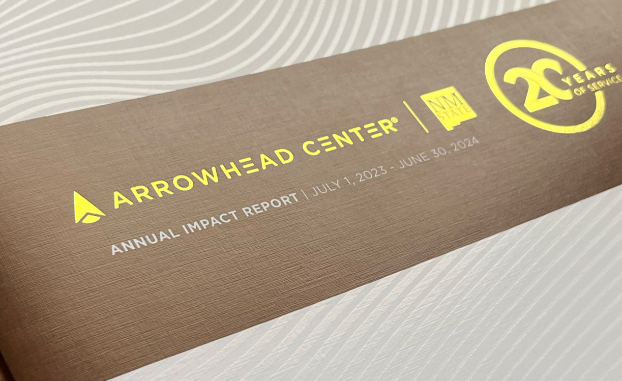 Close-up image of the cover page of the Arrowhead Center annual impact report, dated July 1, 2023, to June 30, 2024, with logos and design elements.