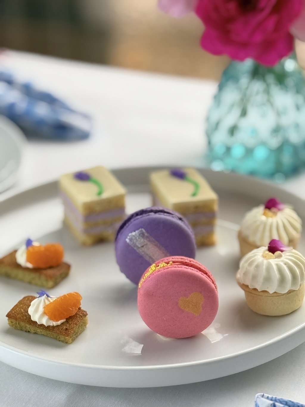 Spring Afternoon Tea pastries from The Ideal Pastry: pink and lavender macarons, pistachio and orange financiers, lemon lavender tea cake and passion fruit tarts
