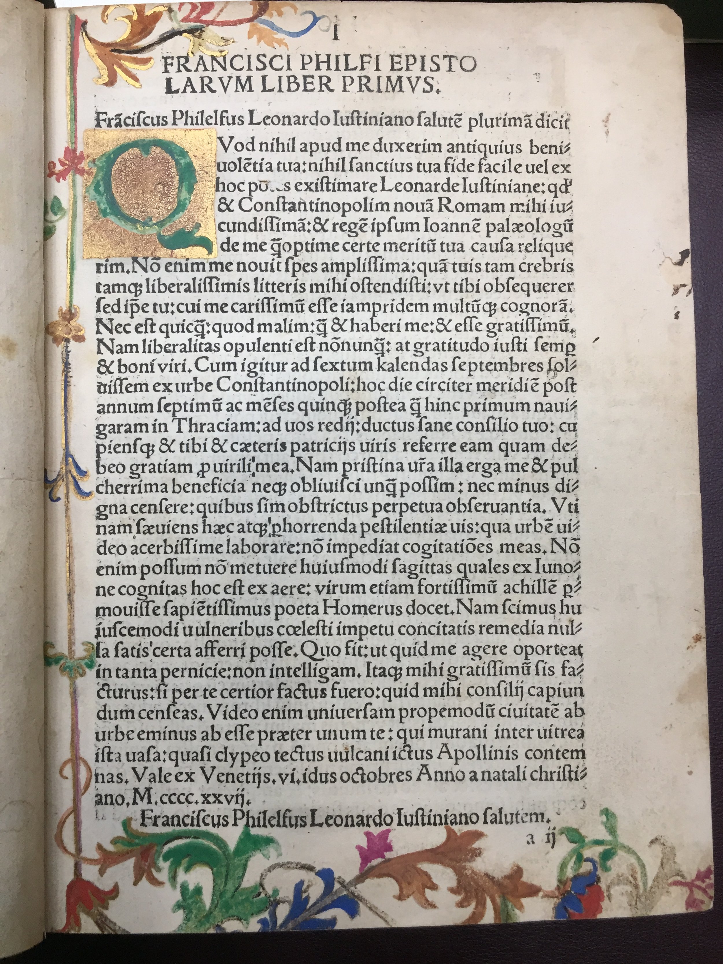 Incunabulum, Latin text, historiated initals, floral and gold embellishments along the borders and a gold initial letter at the beginning of the text.