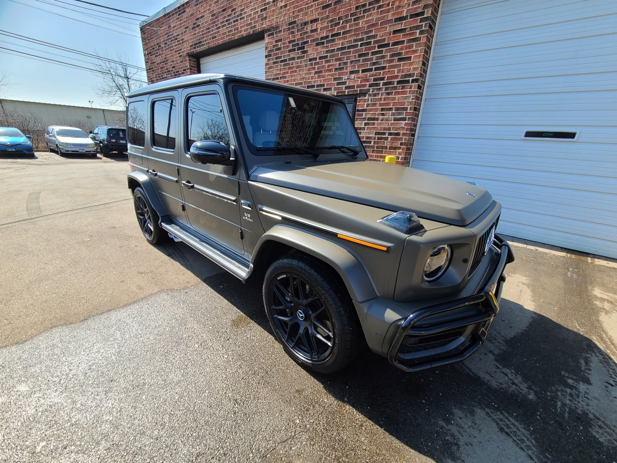 Close-up of a luxury car protected with matte PPF (Stealth Film) installed at our Naperville, IL and Countryside shop.