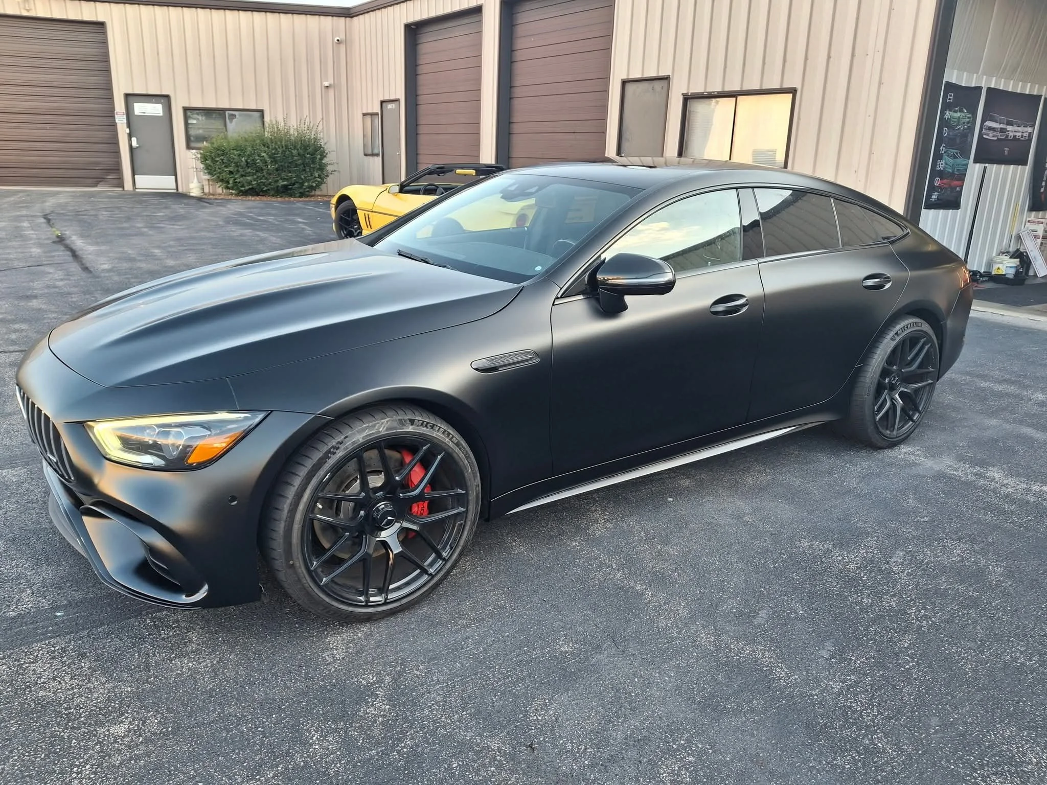 Black vehicle with a deep satin finish achieved using Stealth PPF installation near Naperville, IL and Countryside.