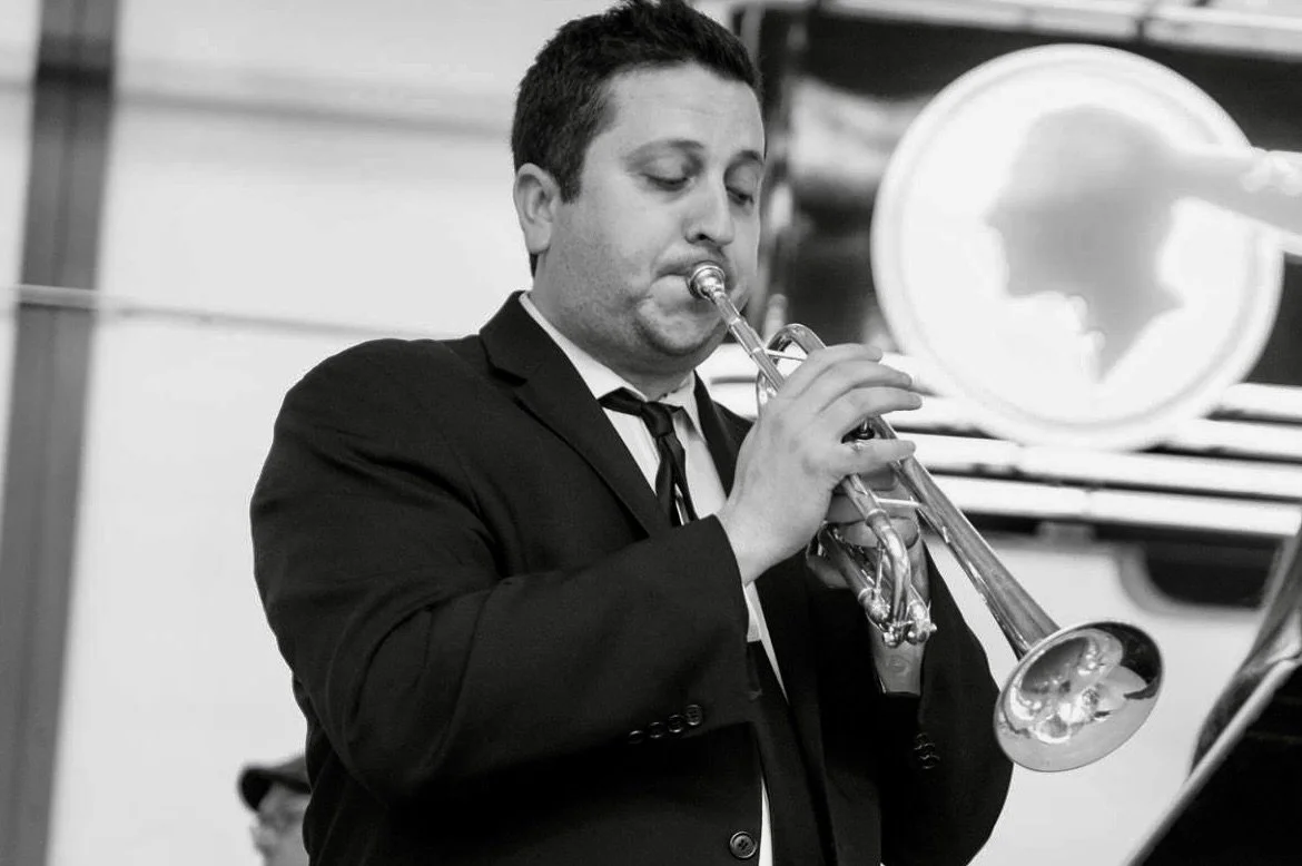 Ryan B&W headshot with Trumpet.JPG