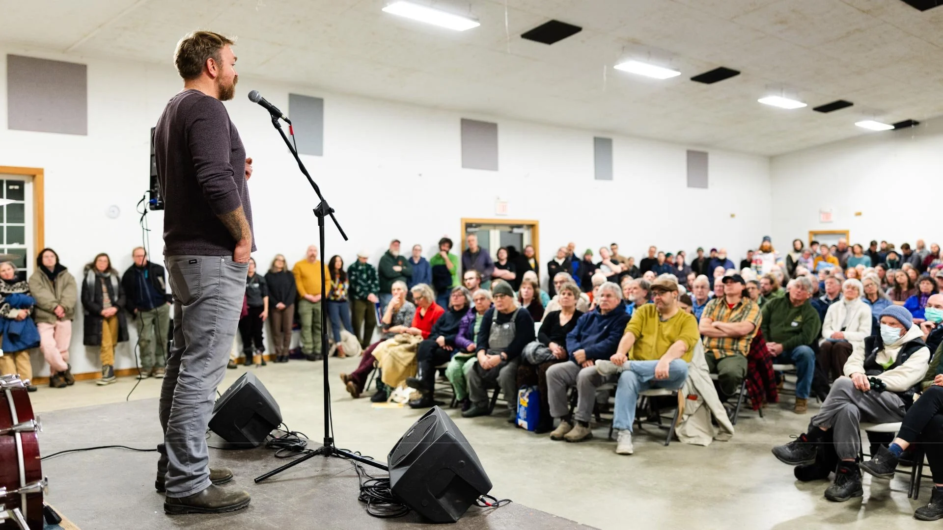A photo of Graham Platner, candidate for U.S. Senate in Maine, holding a town hall.