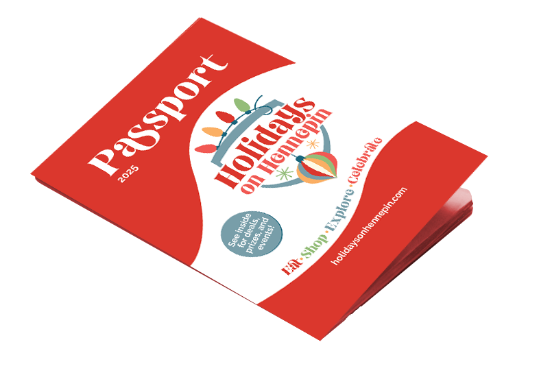 2025 holiday-themed passport booklet for the holiday season, featuring colorful Christmas ornaments and festive icons on the cover.