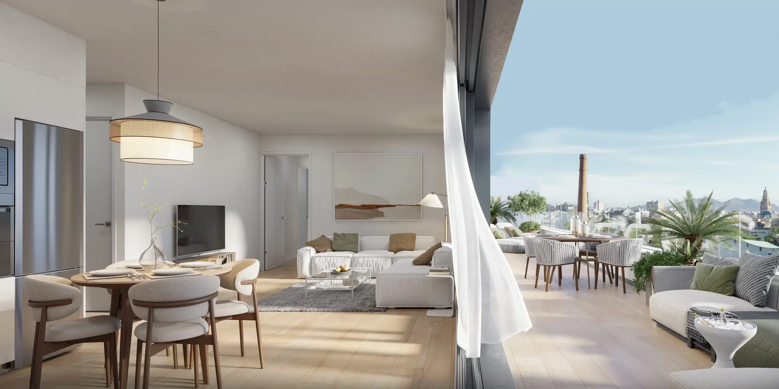 Interior of a modern apartment with a dining area, living room, and a large open balcony with outdoor seating and city view.